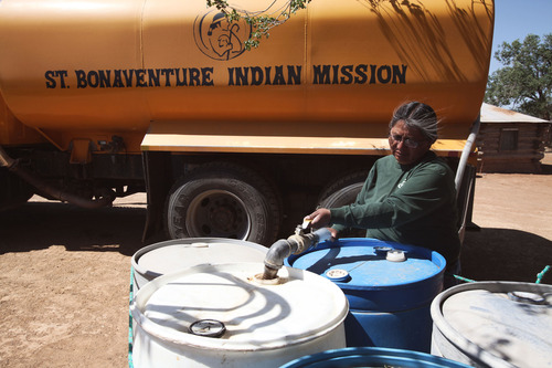 A woman delivers clean water in Navajo communities. Photo via http://digdeeph2o.tumblr.com/ .