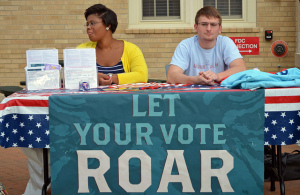 Students at the University of Missouri encourage their peers to register to vote.