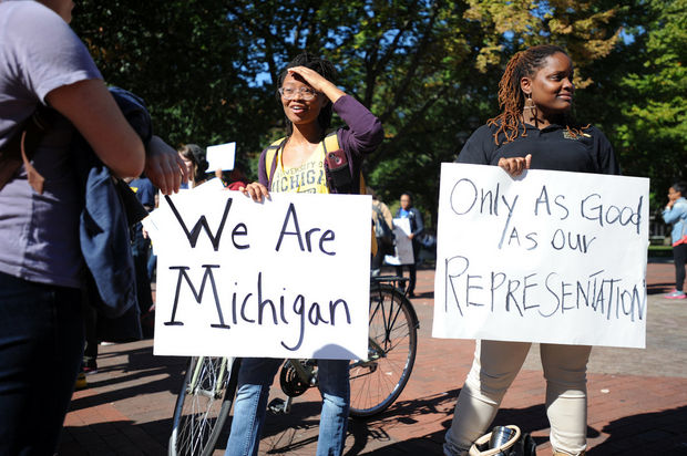 Michigan students raise awareness on campus of a decline in minority enrollment. Photo via mlive.com