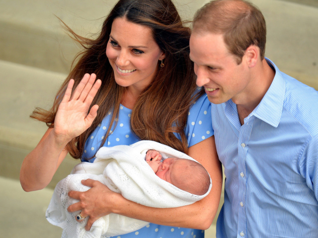 The royal couple with Prince George. Photo via newsfeed.time.com