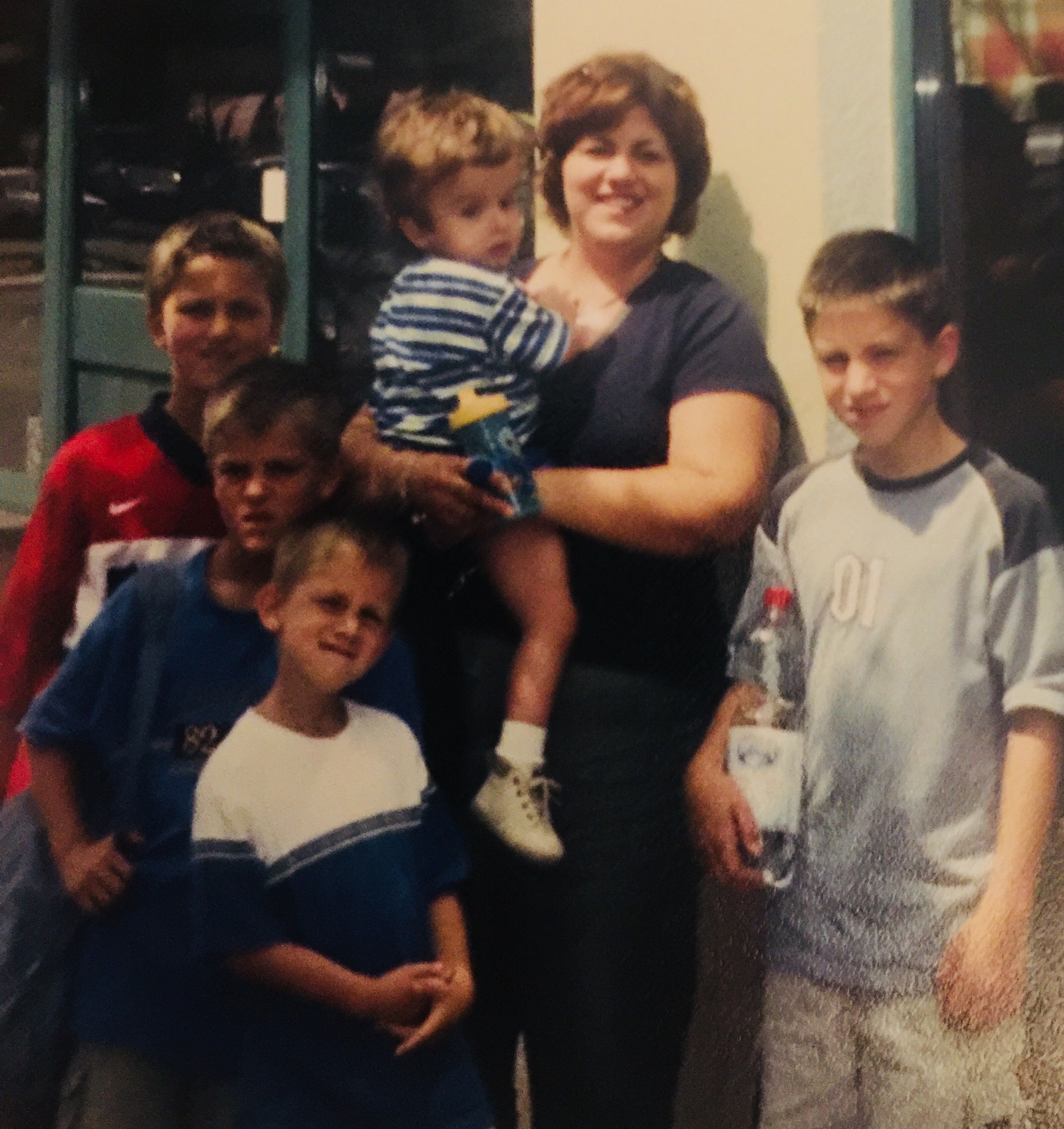 Kim and her boys shortly after Kujtim’s adoption.