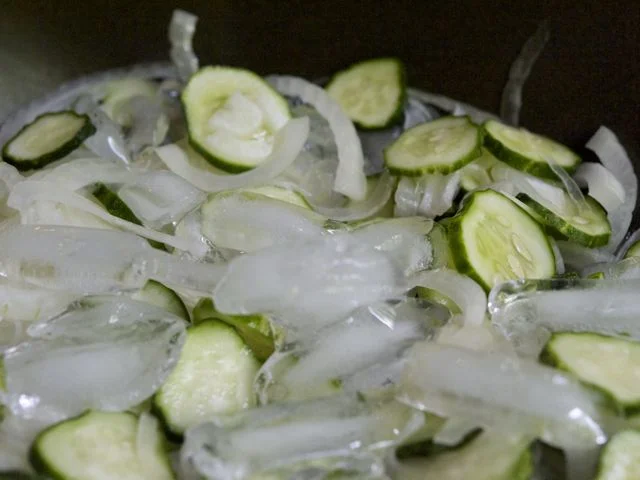 Cucumbers for the bread-&-butters sit in an ice bath for a few hours