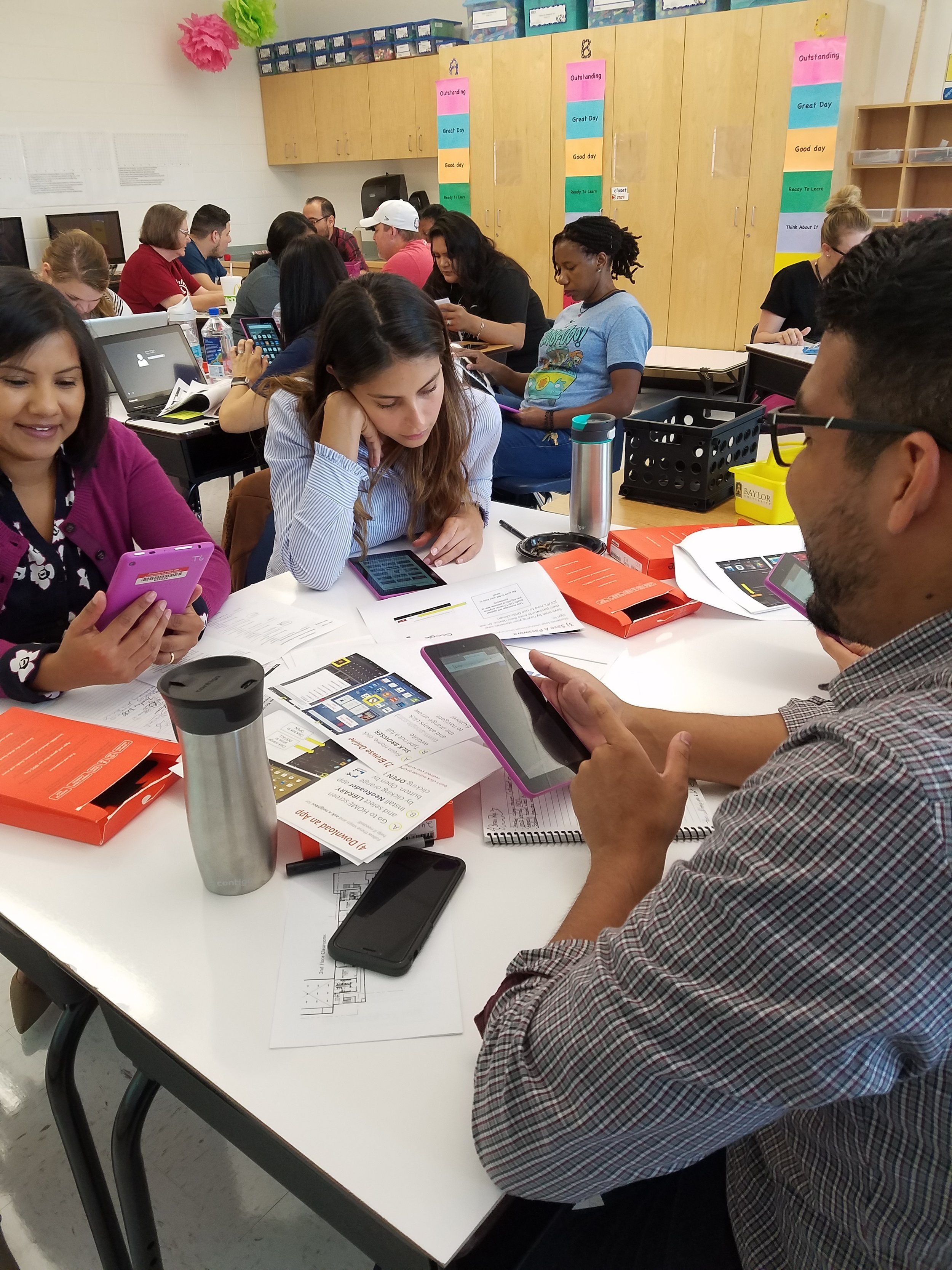  Teachers and administrators in the Samuell Feeder are getting trained before school starts on how to prepare for a 11 Kindle experience. 