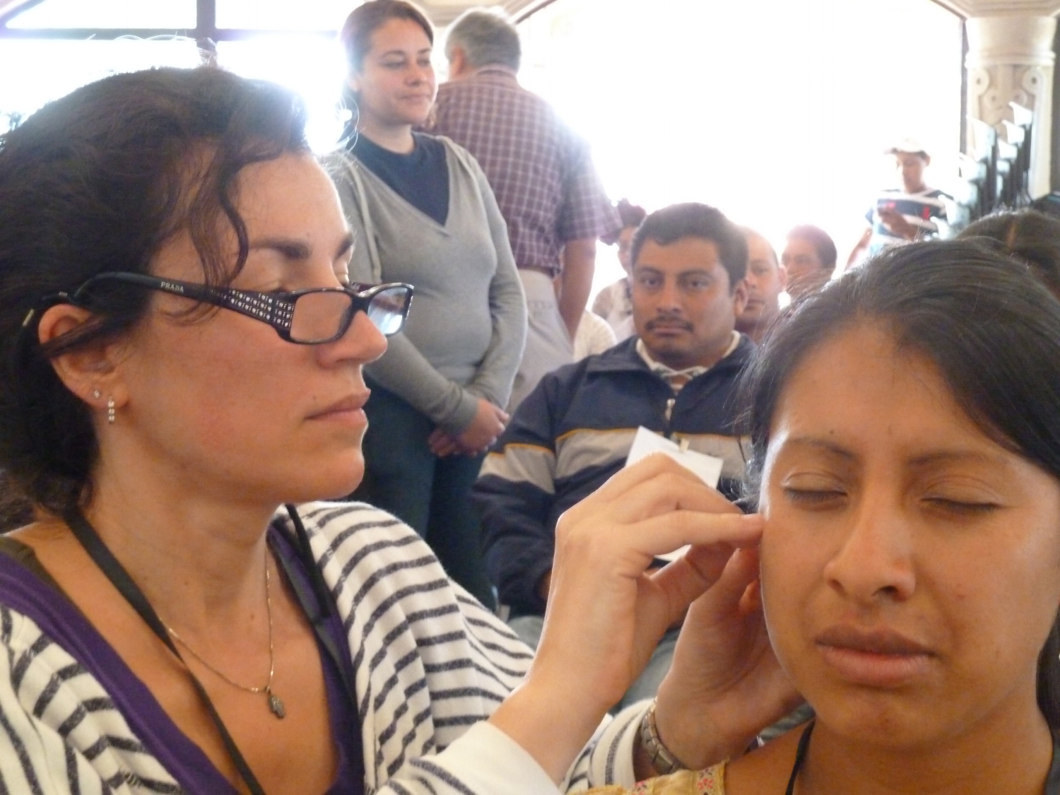 Teo demonstrates auricular treatment
