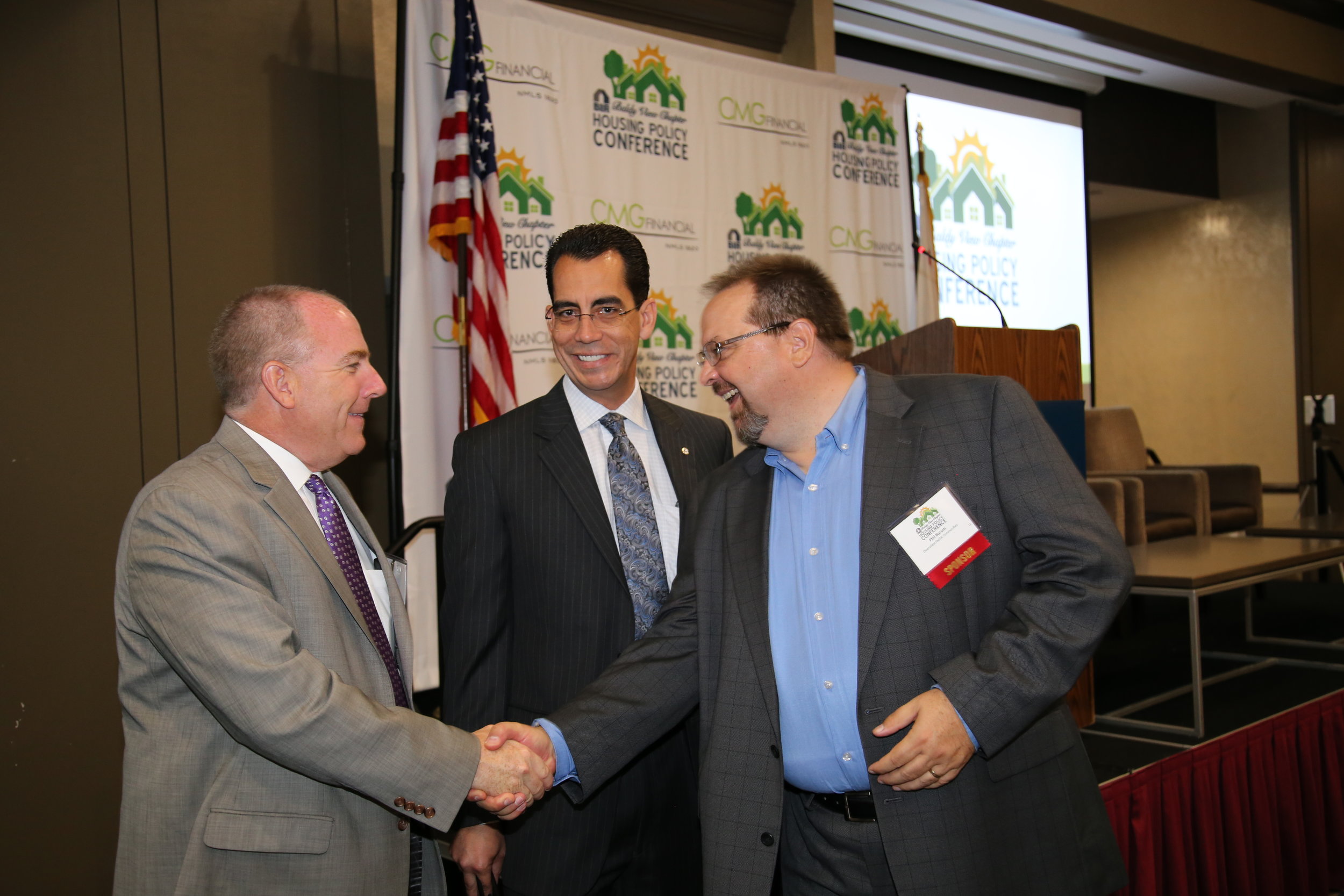  NAHB VP Lake Coulson greets BIABV President Phil Burum along with BIABV CEO Carlos Rodriguez (center) 