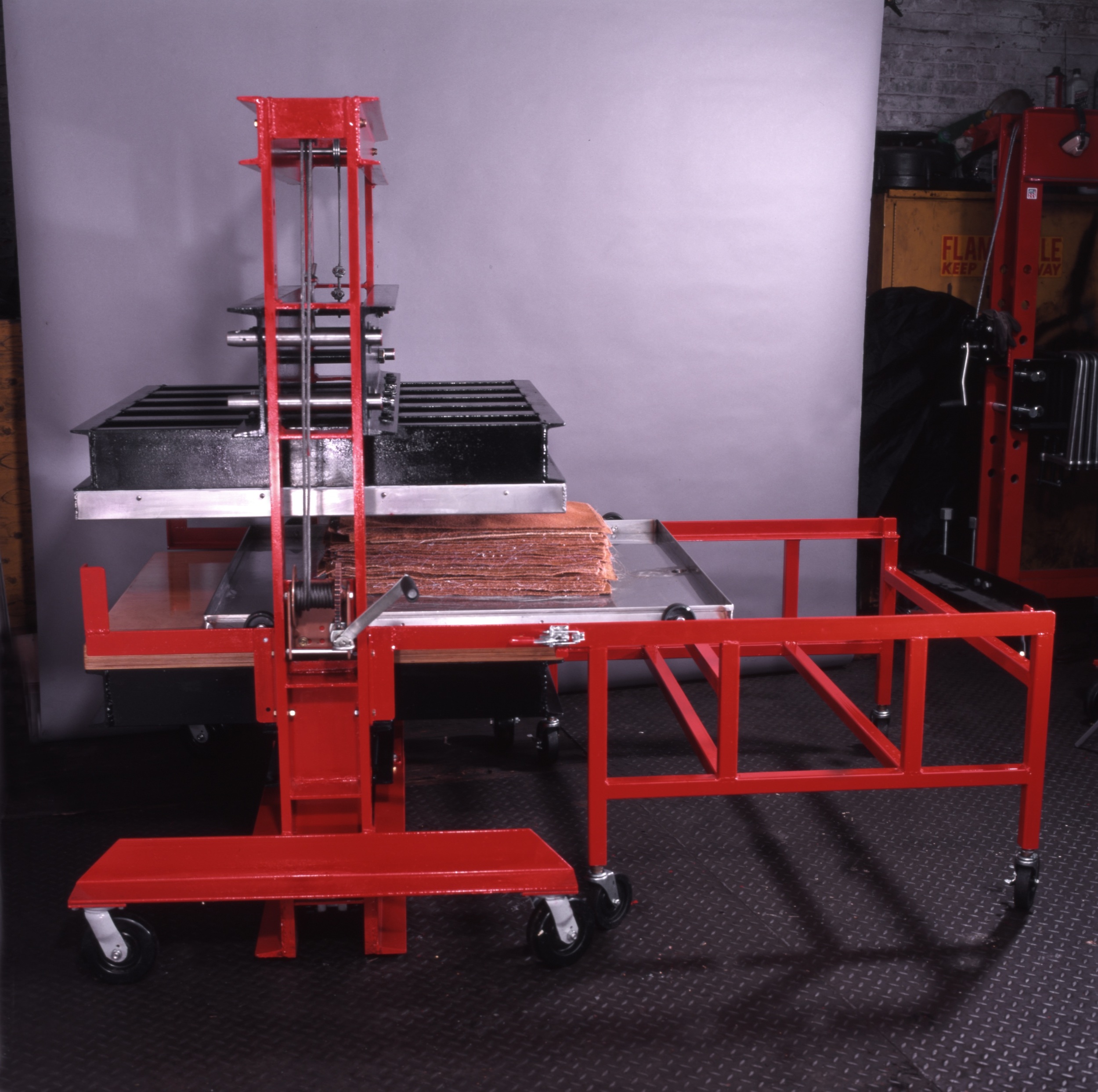 50-ton hydraulic press and rolling cart