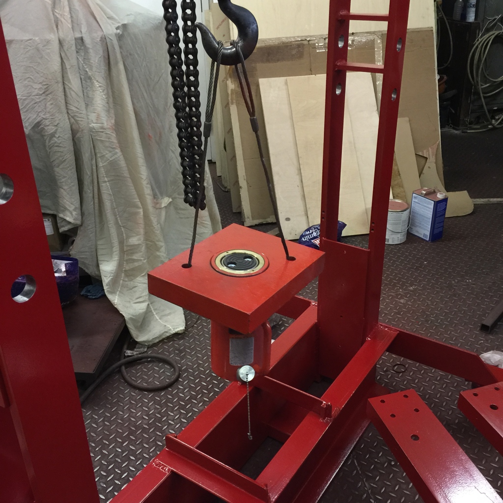 Lowering hydraulic ram into press