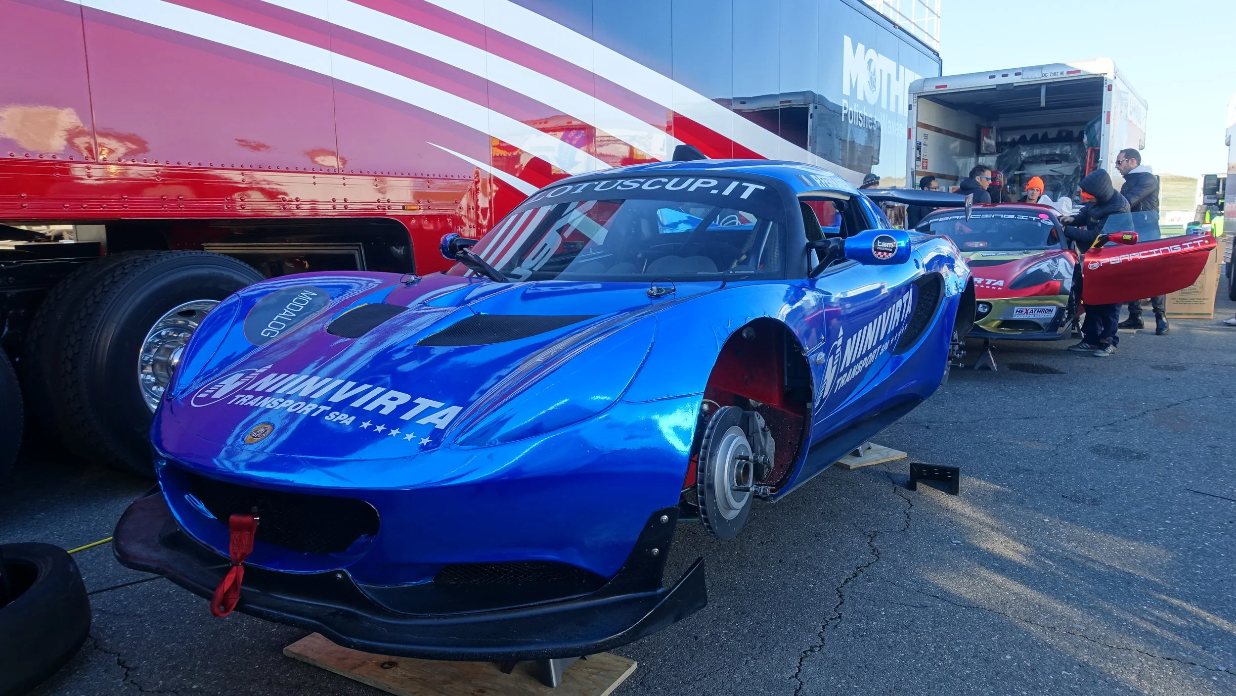 The blue car was here to provide spare parts, if needed.
