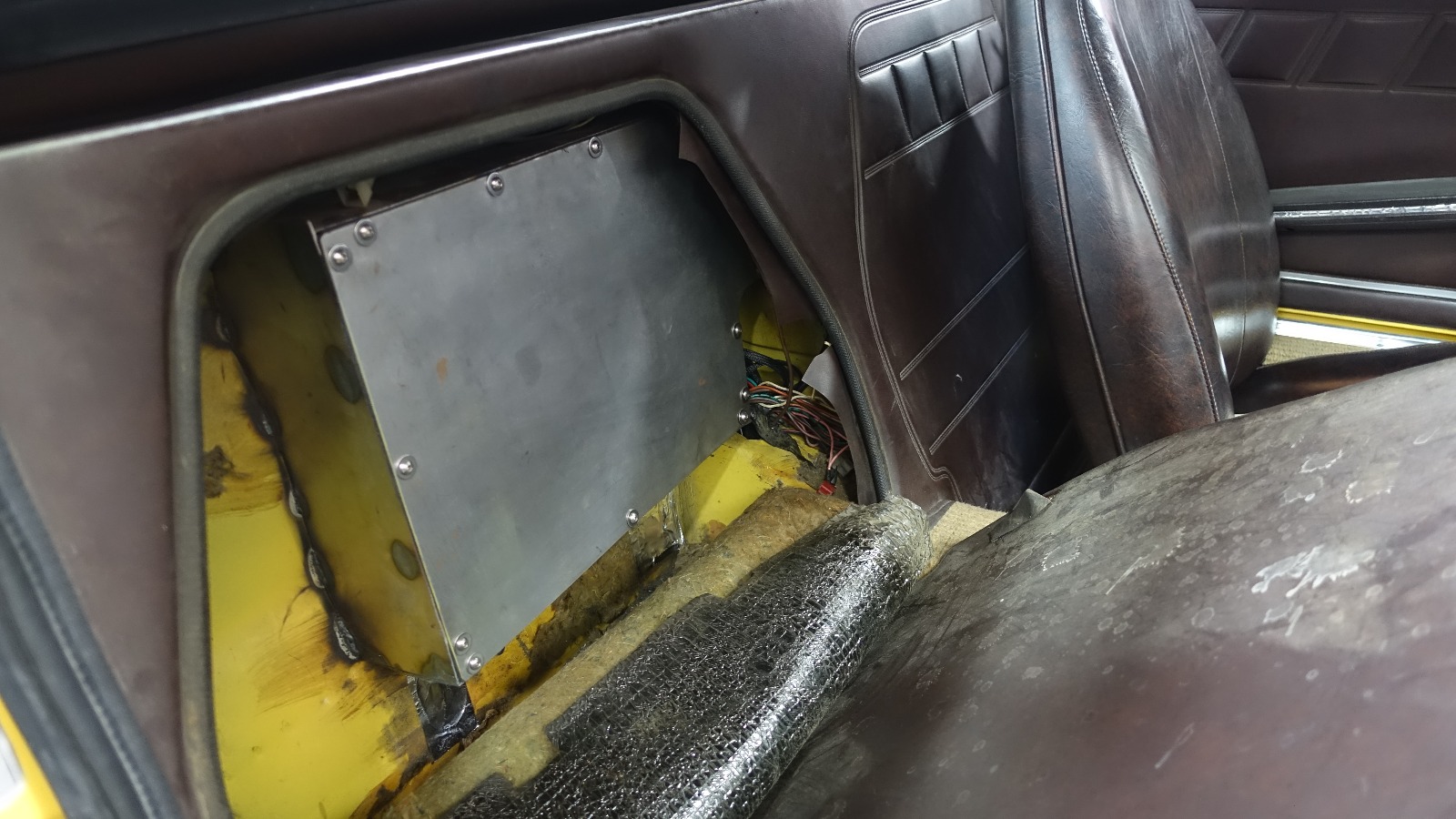 Here's the box from the interior right behind the passenger seat.