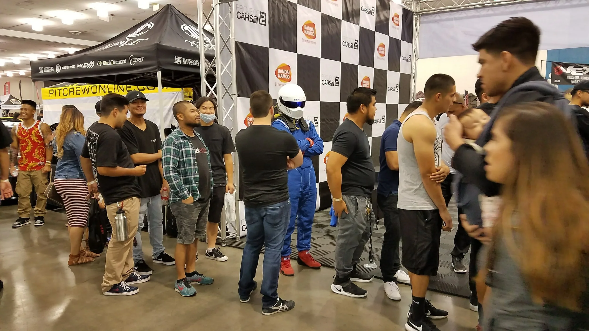 Our mechanic, Son, waits patiently in line to place Project Cars.