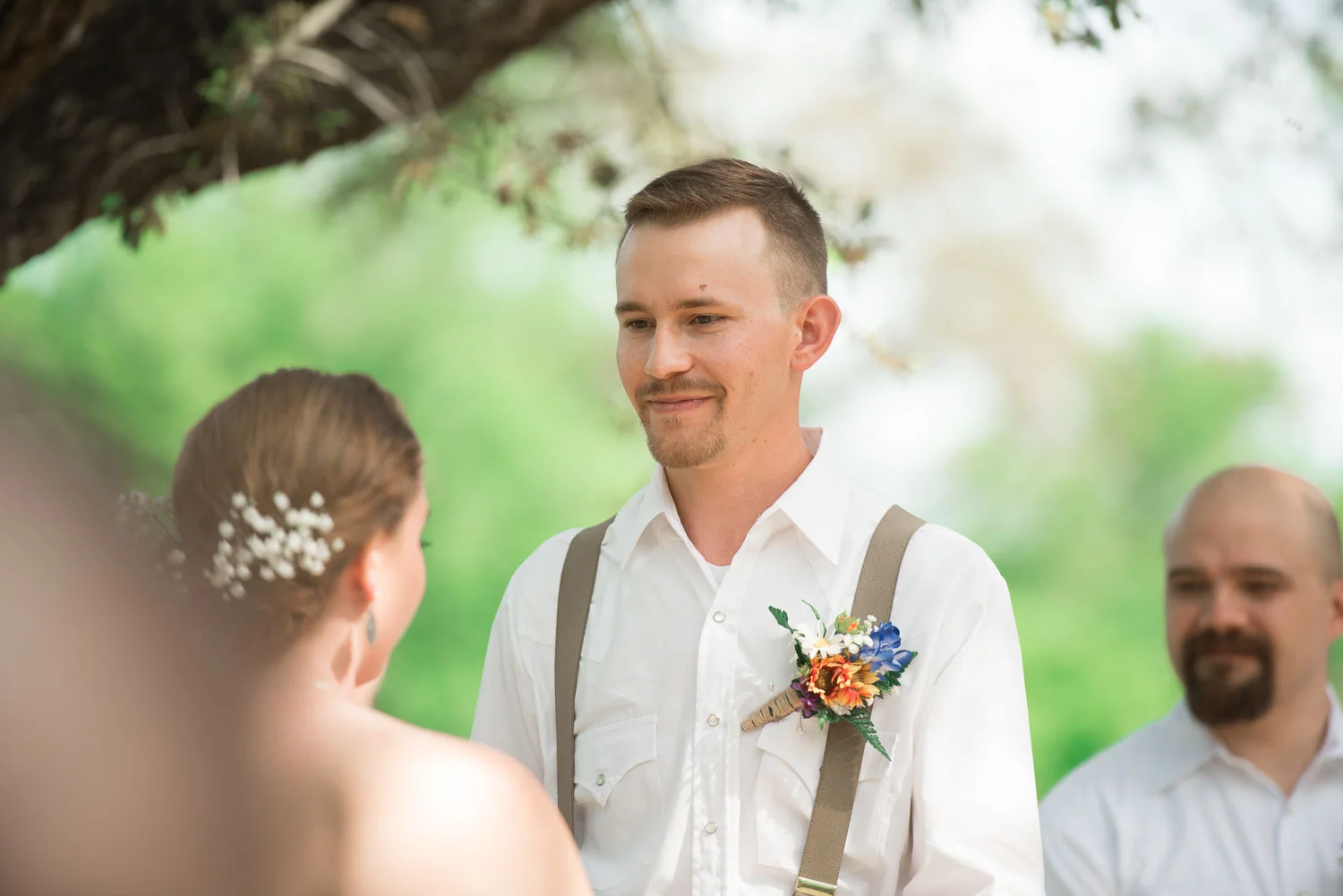 39 The bride and groom stand together at the altar.jpg