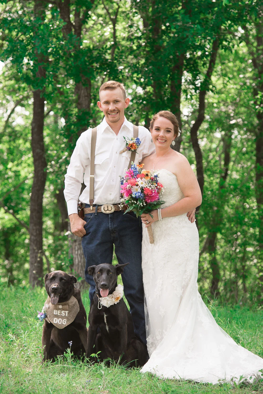 56 Bride and groom with their dogs during bridal portraits.jpg