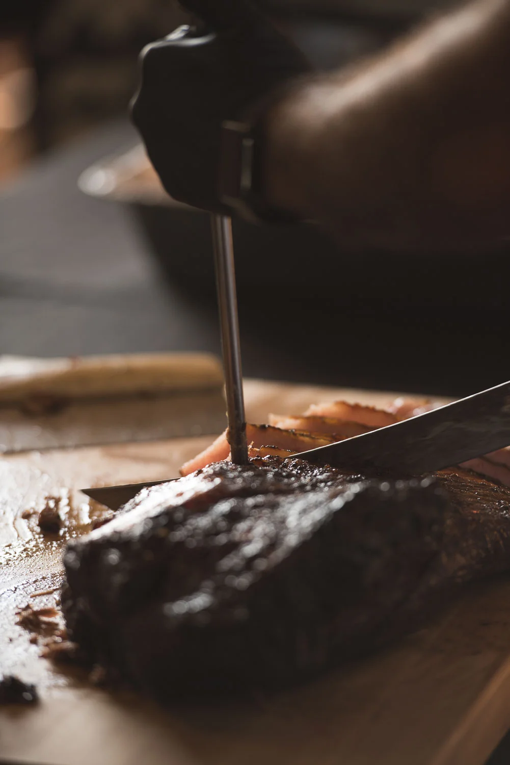 68 caterer cutting brisket from Kreuz barbecue.jpg