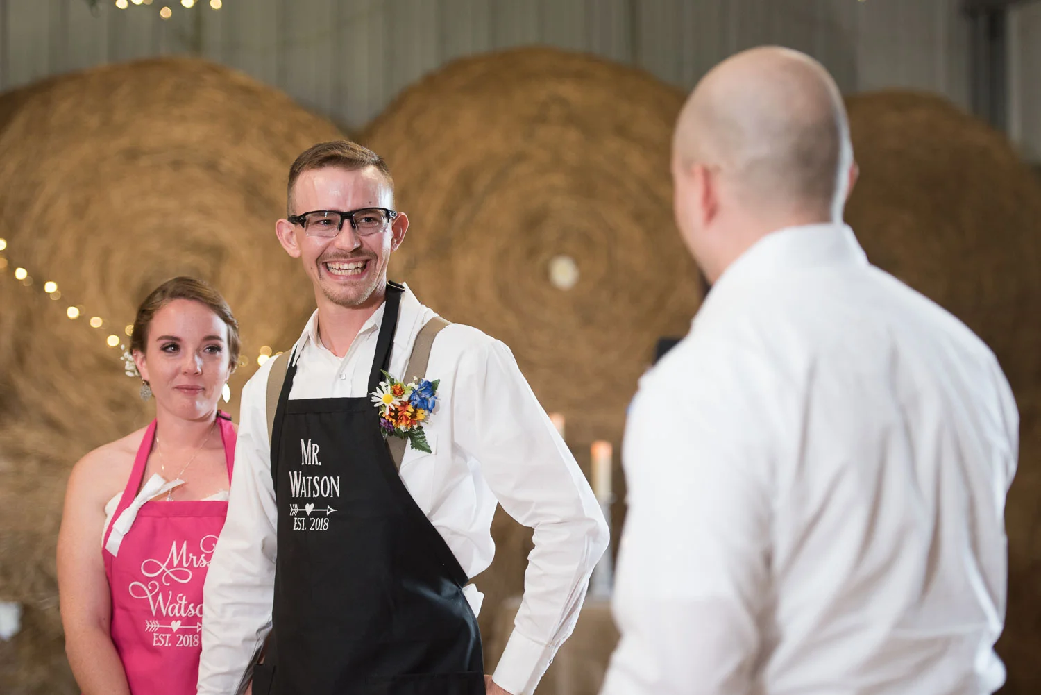 76 groom laughing at best mans speech.jpg