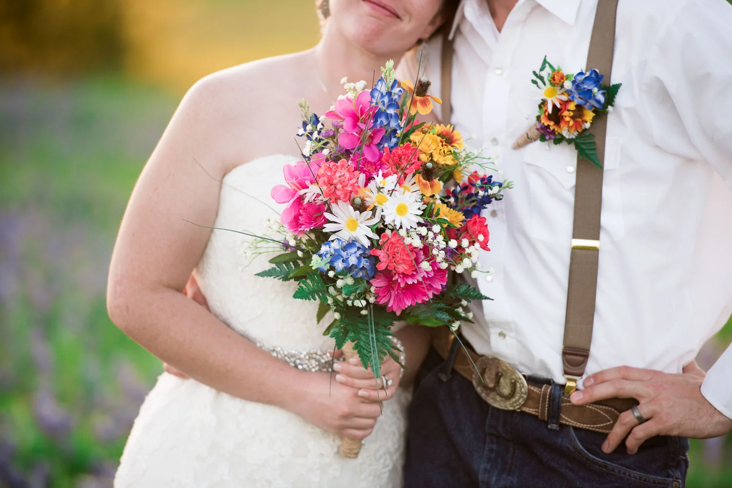 93 close up of bride and groom with floral.jpg