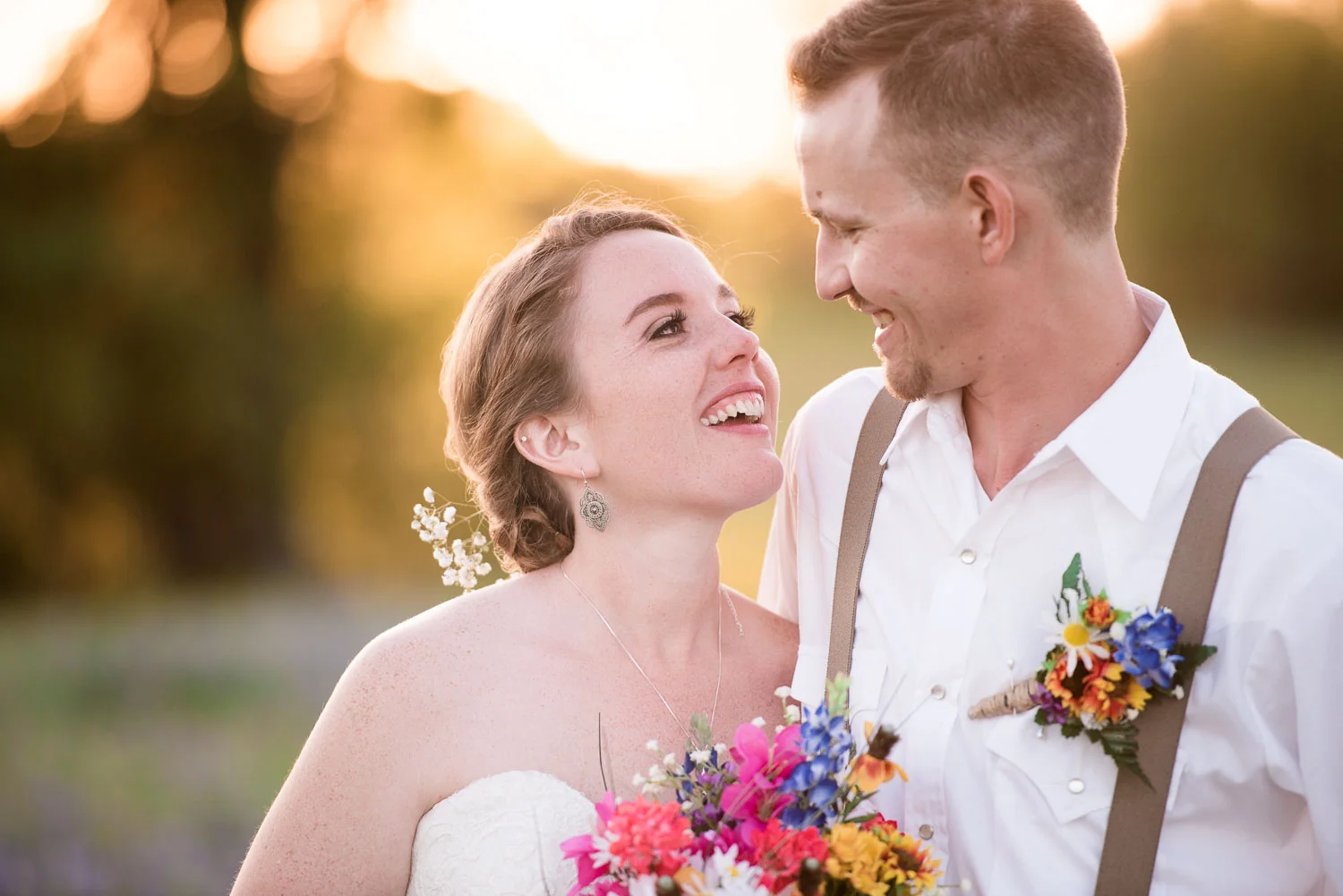 94 bride and groom at sunset in texas field.jpg