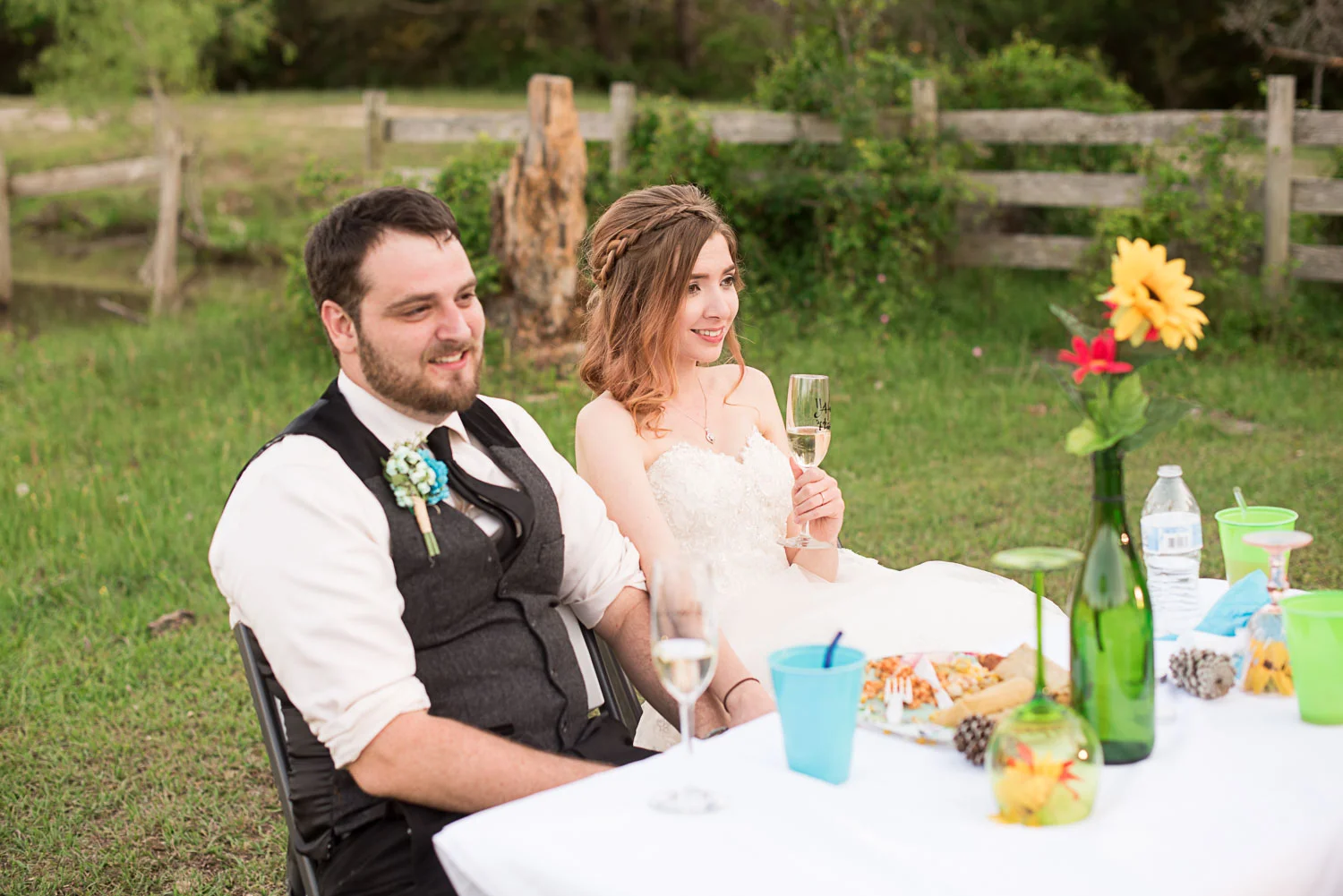139 bride and groom during speeches.jpg