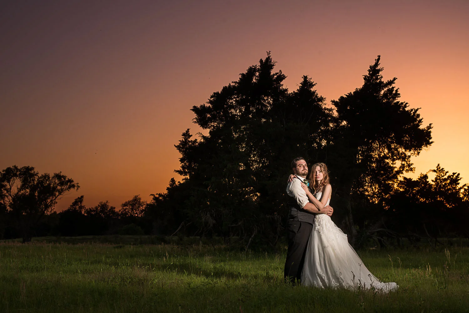 174 wedding photography during sunset on farm land.jpg