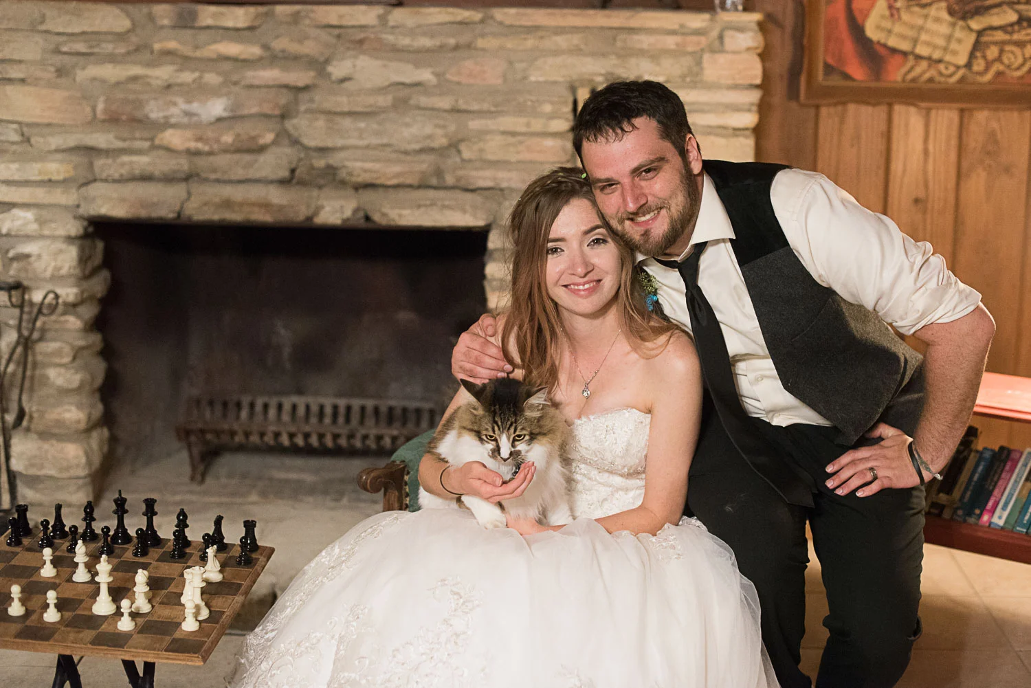 197 bride and groom with pet cat at wedding.jpg