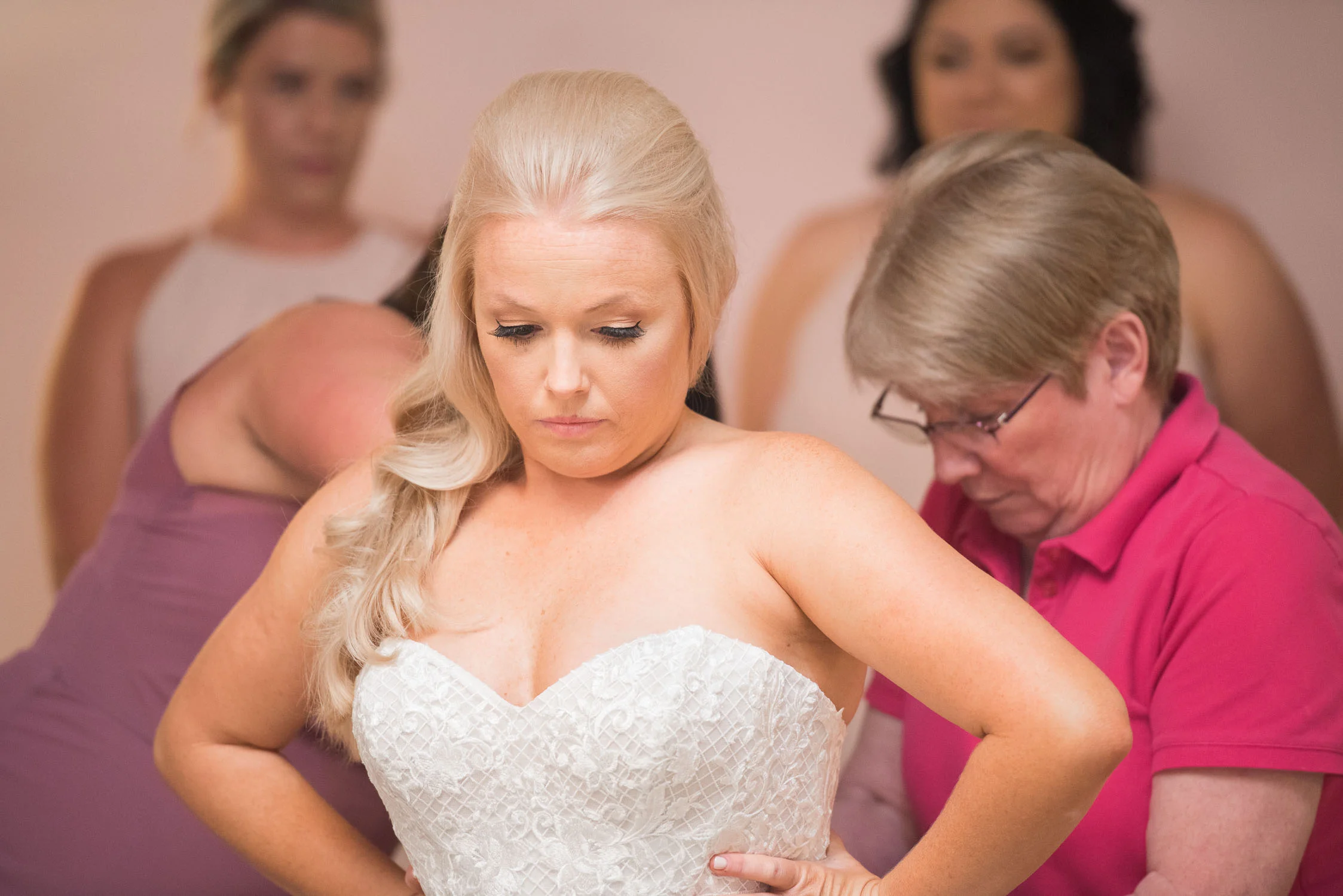 26 mother helping bride get ready.jpg