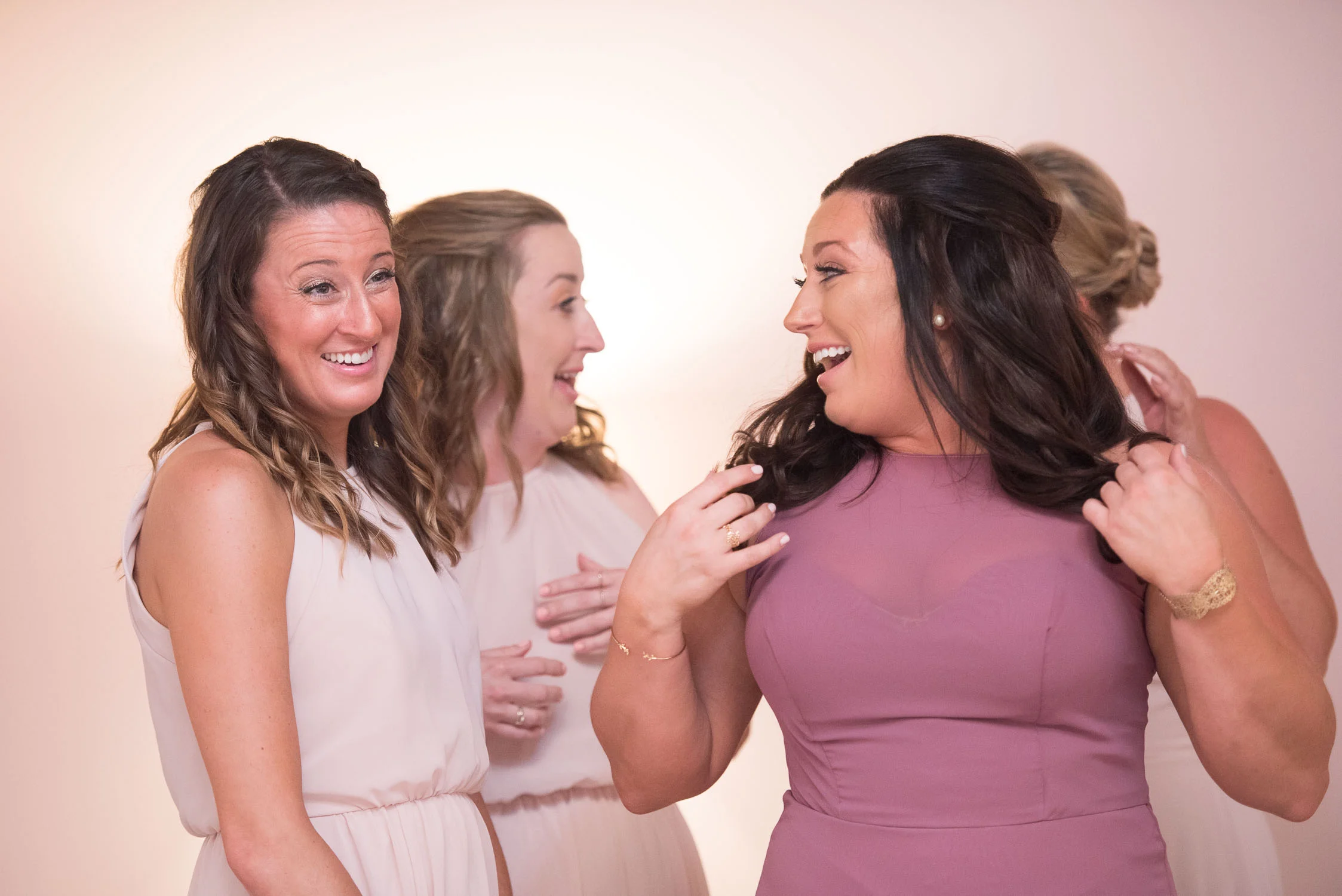 28 bridesmaids getting ready in bridal suite.jpg