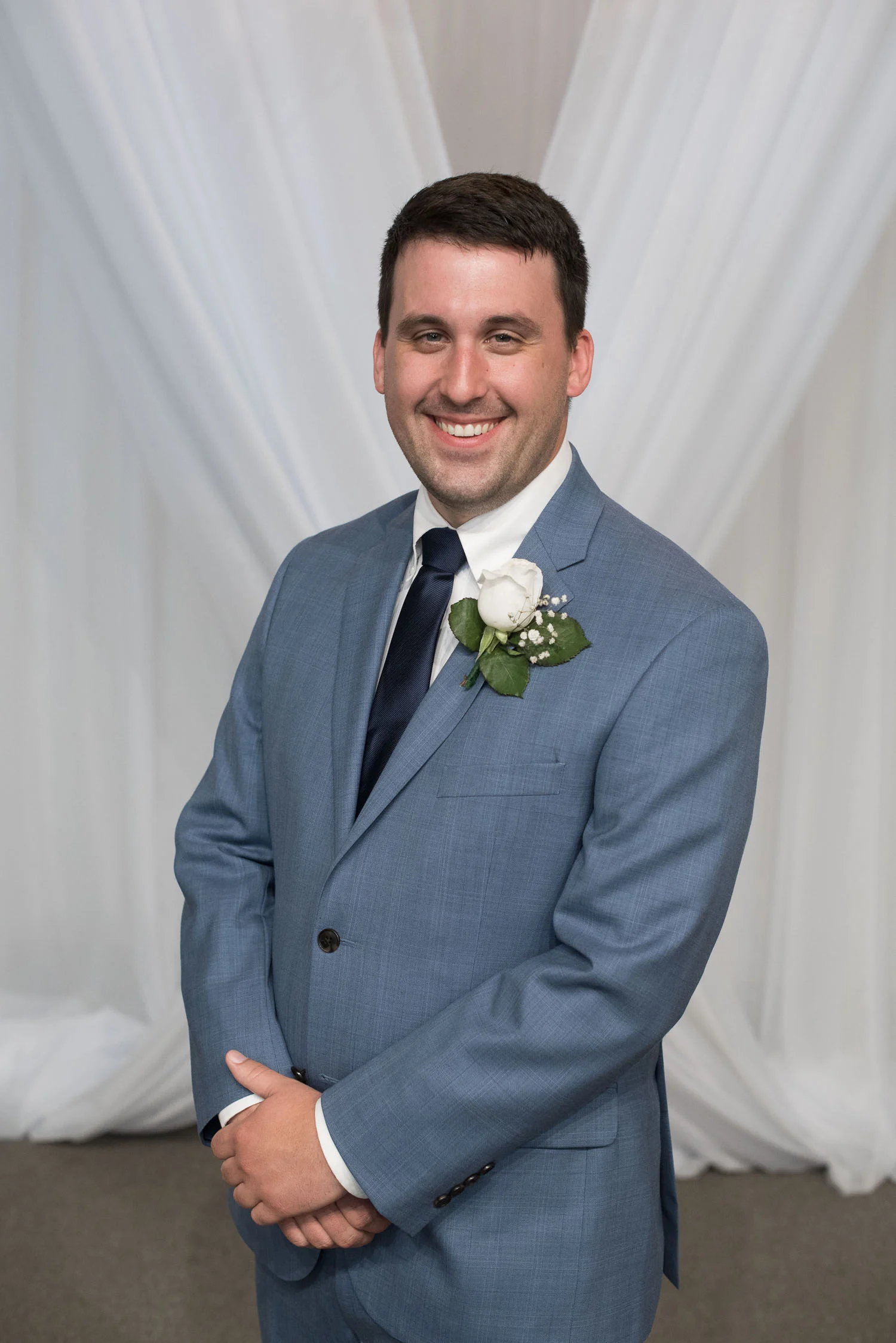 84 groom portrait on stage at mission theater.jpg