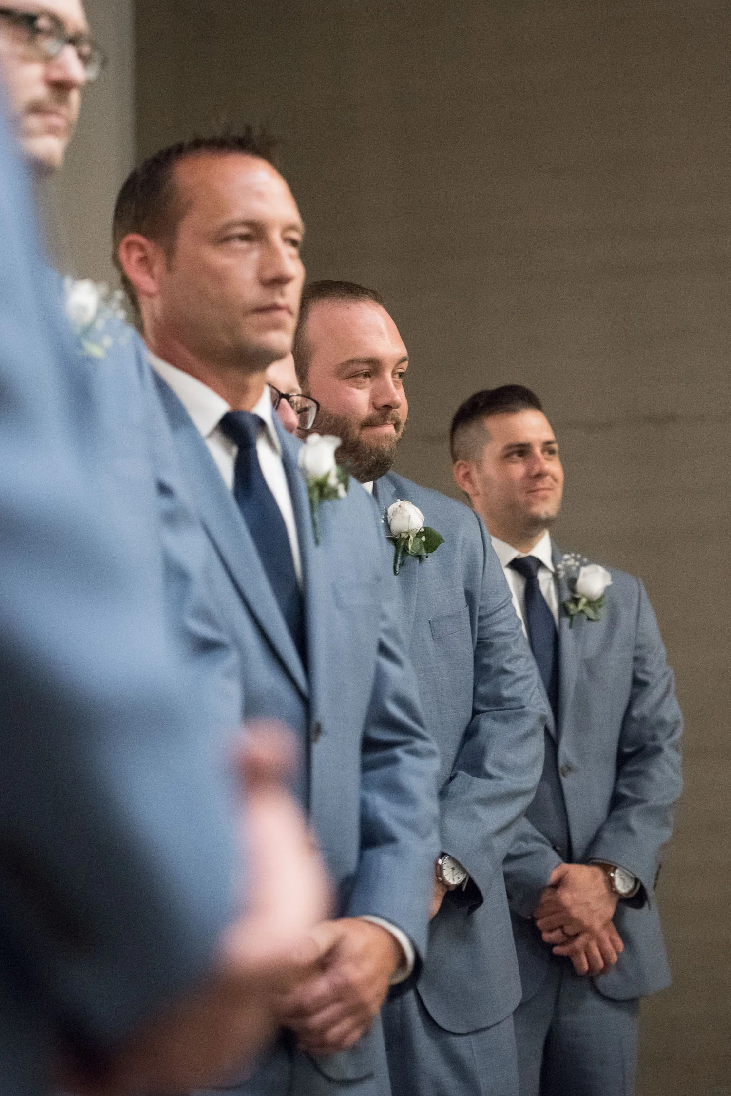 86 groomsmen in line at wedding.jpg
