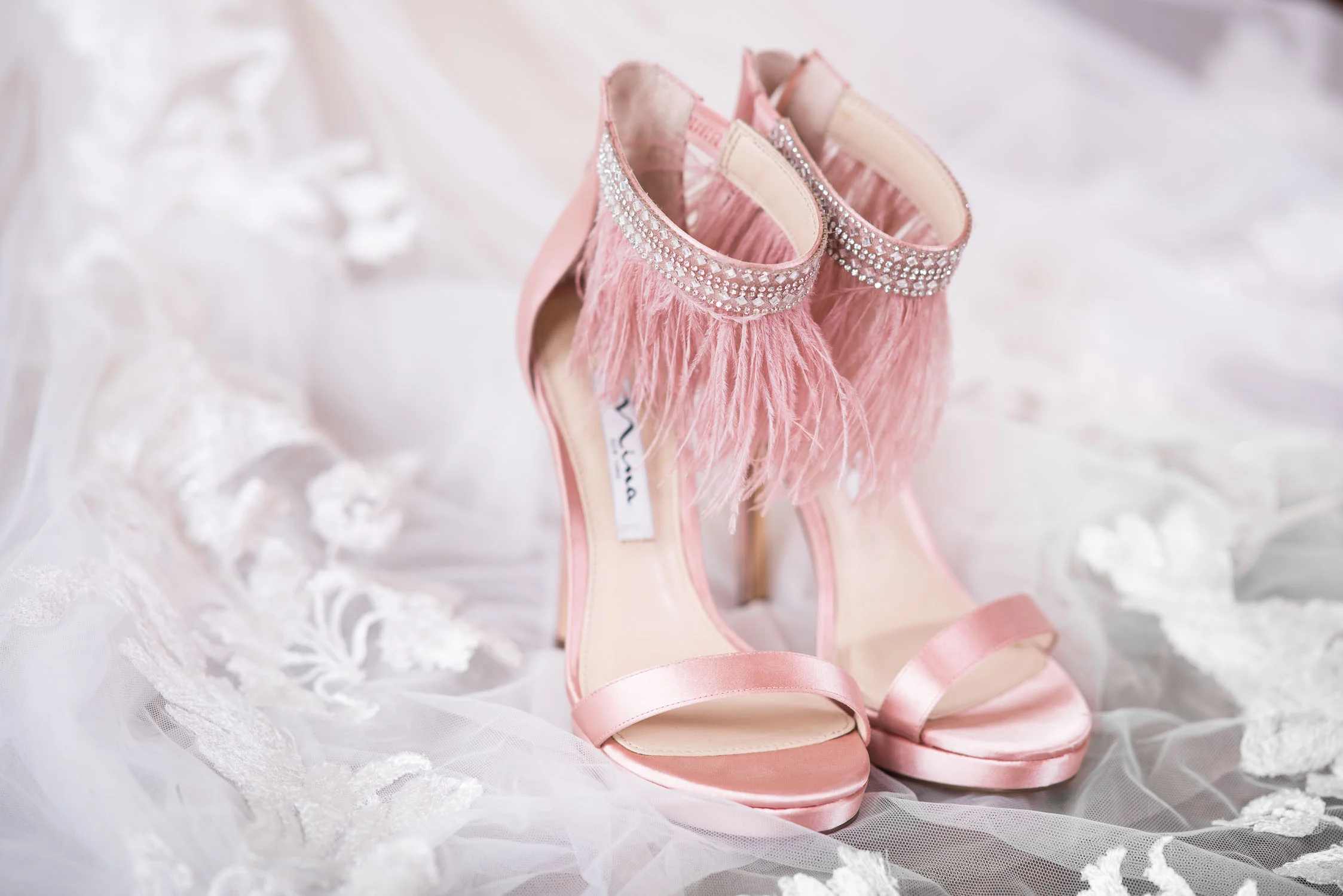 2 blush wedding shoes with fringe.jpg