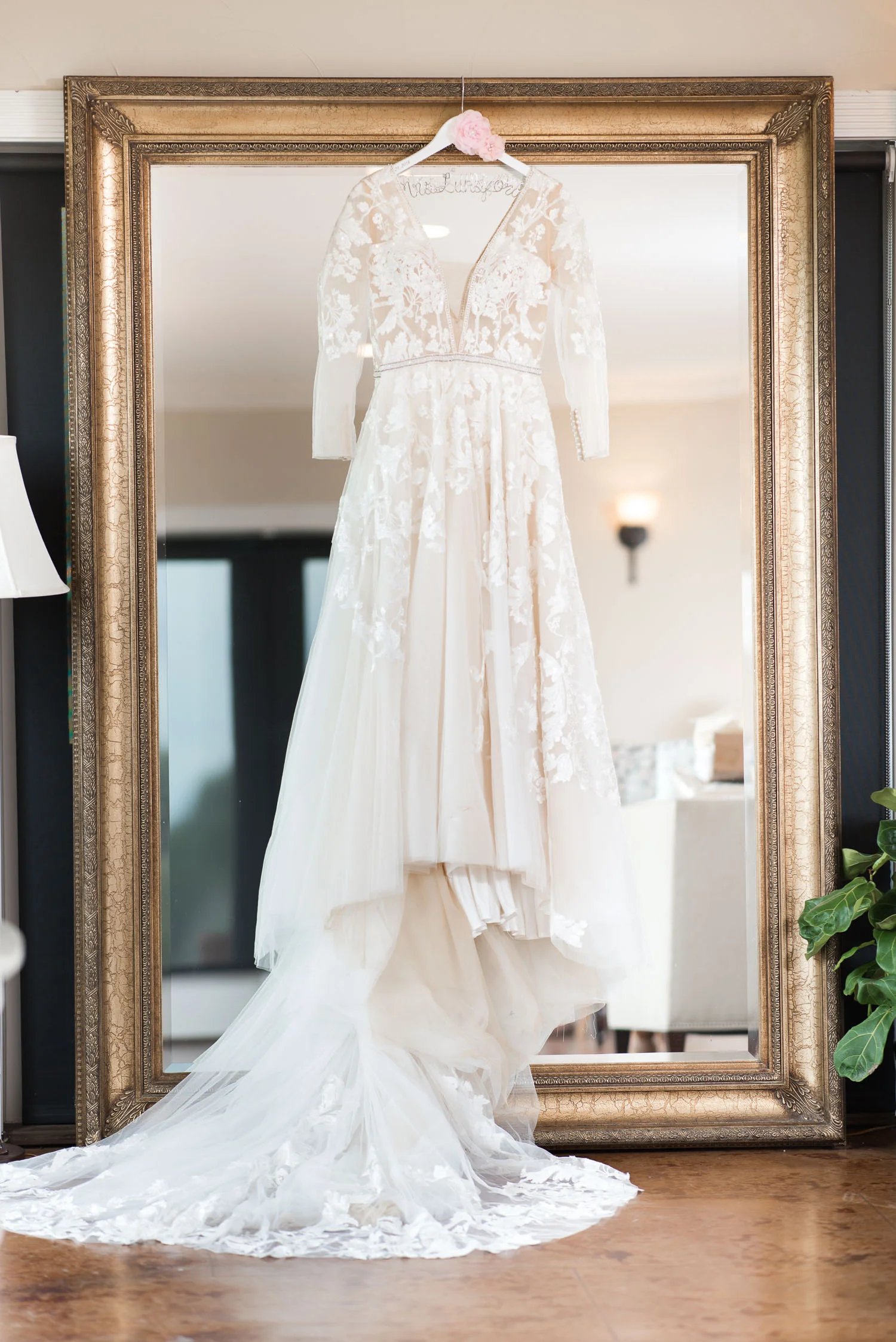 1 Wedding Dress hanging on vintage mirror.jpg