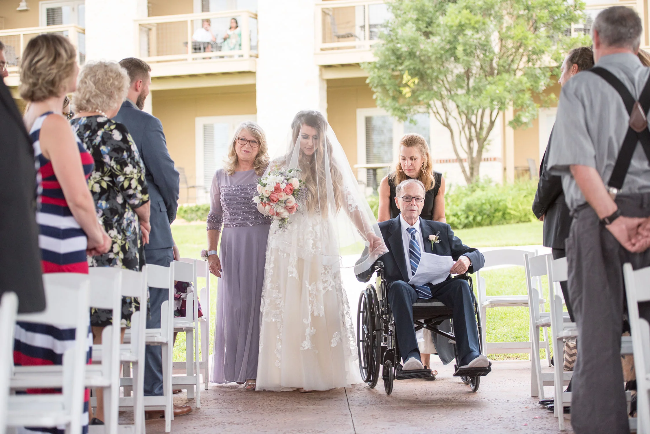 67 bride walks down aisle at vintage villas.jpg
