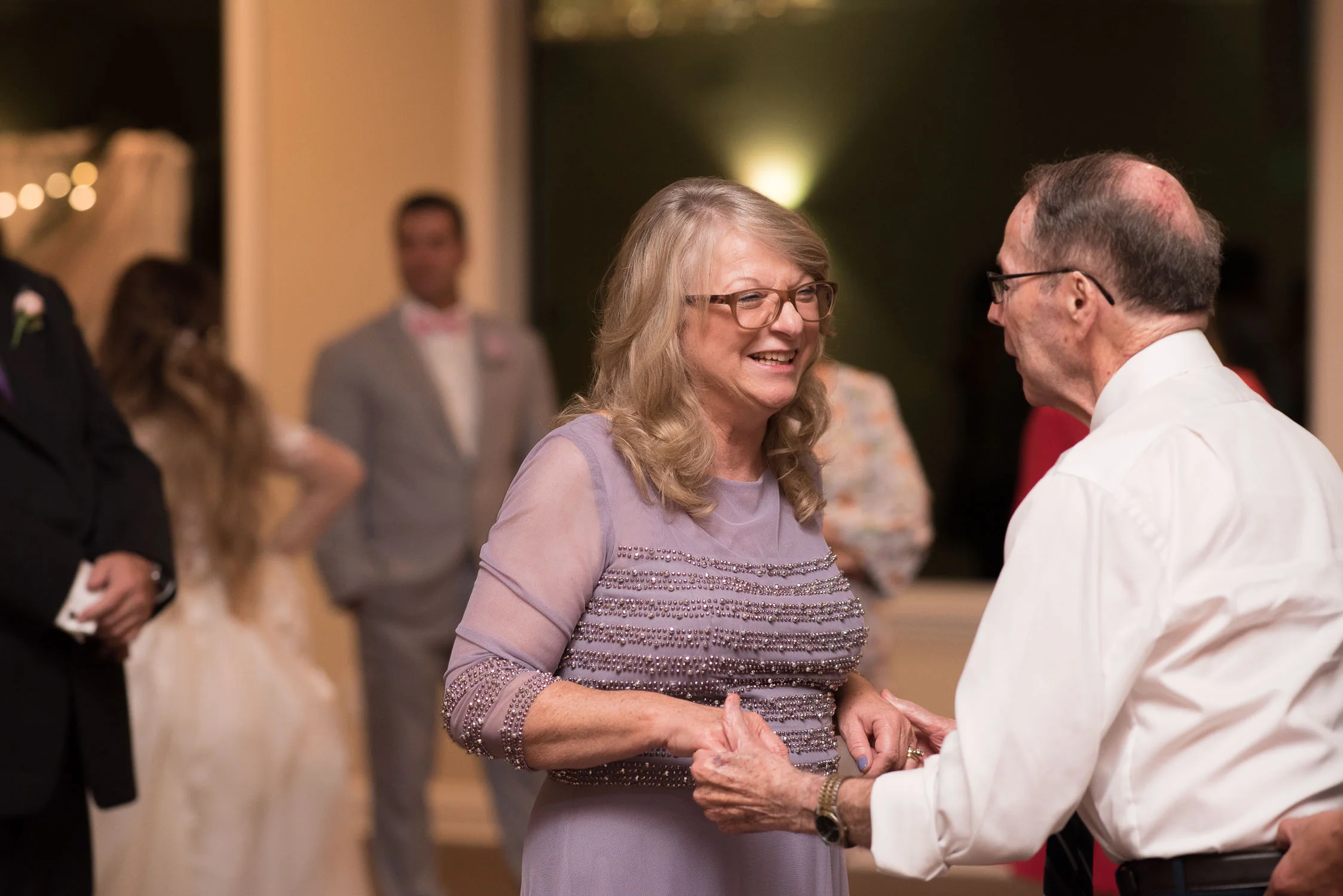 155 brides parents at wedding reception.jpg