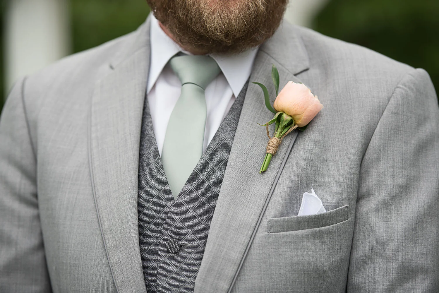 112 boutonniere with peach rose.jpg