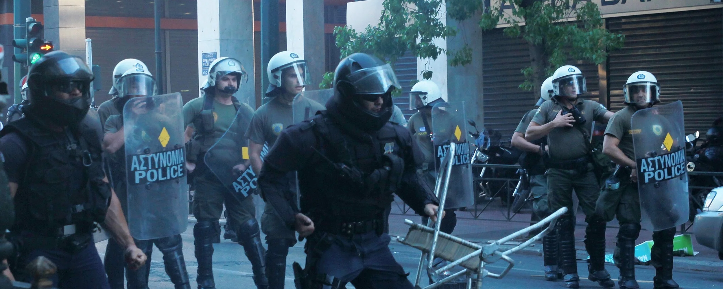 greek-riot-police-use-stun-grenades-on-protesters-ahead-of-pivotal-bailout-vote-1436014431.jpg