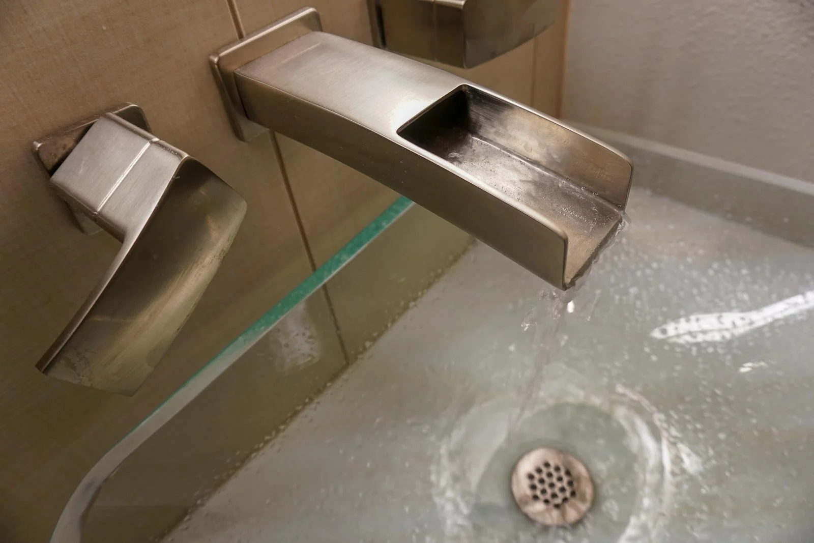 Wall-mounted faucet . . .