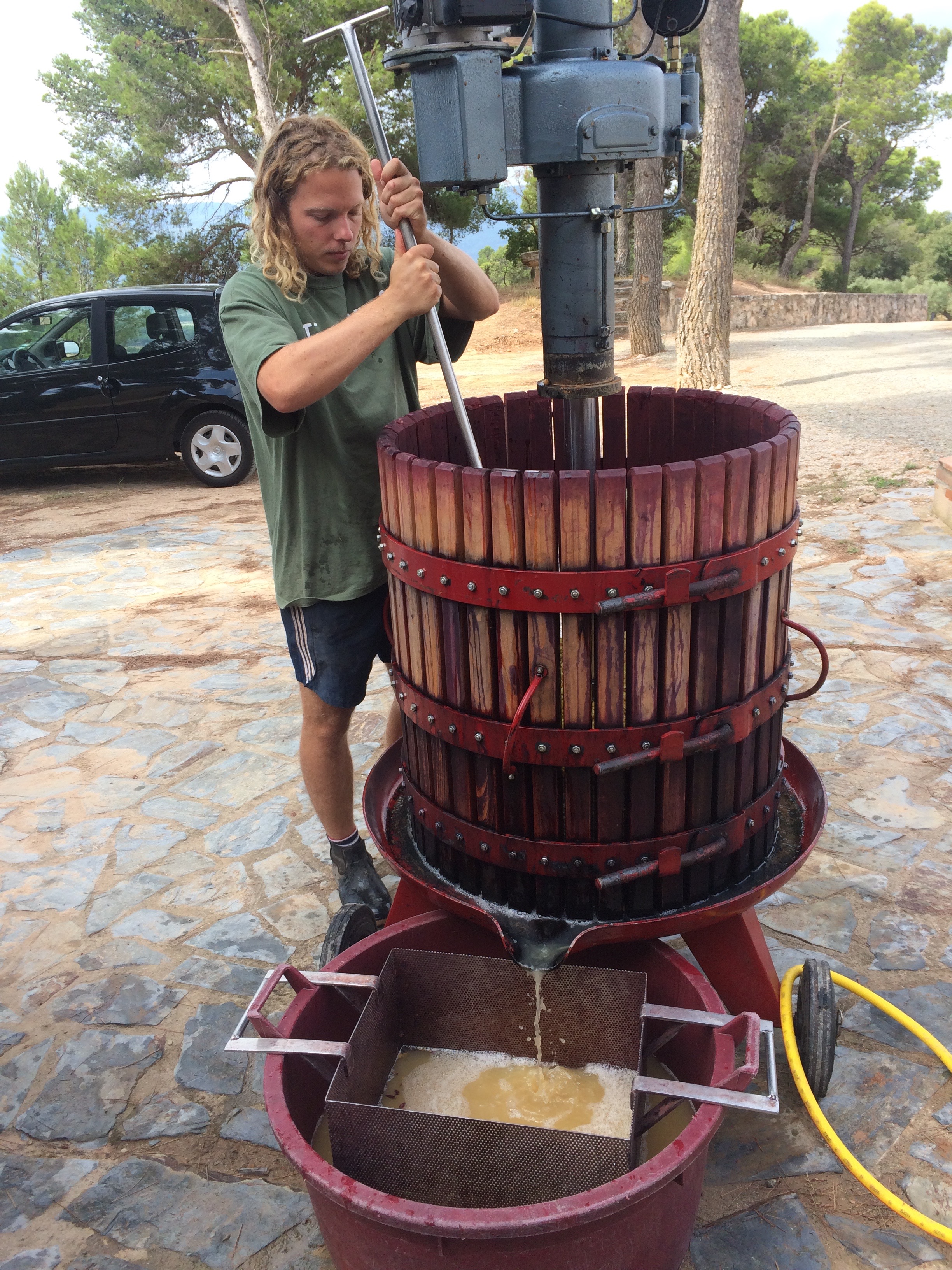 BEAUTIFUL JUICES FLOWING FROM THE OLD BASKET PRESS