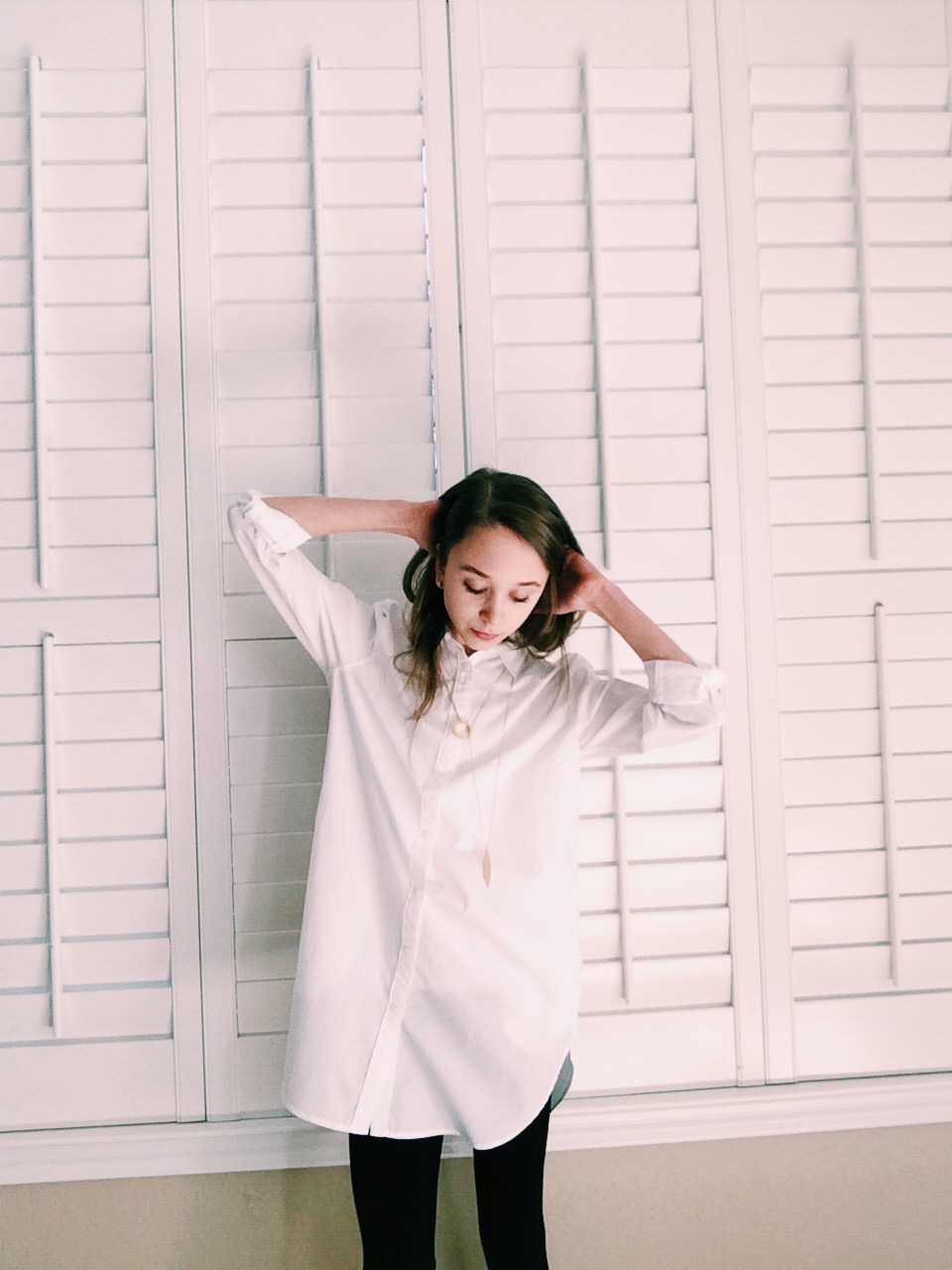 Shirt: Madewell, Necklace: Madewell, Pants: Old Navy 