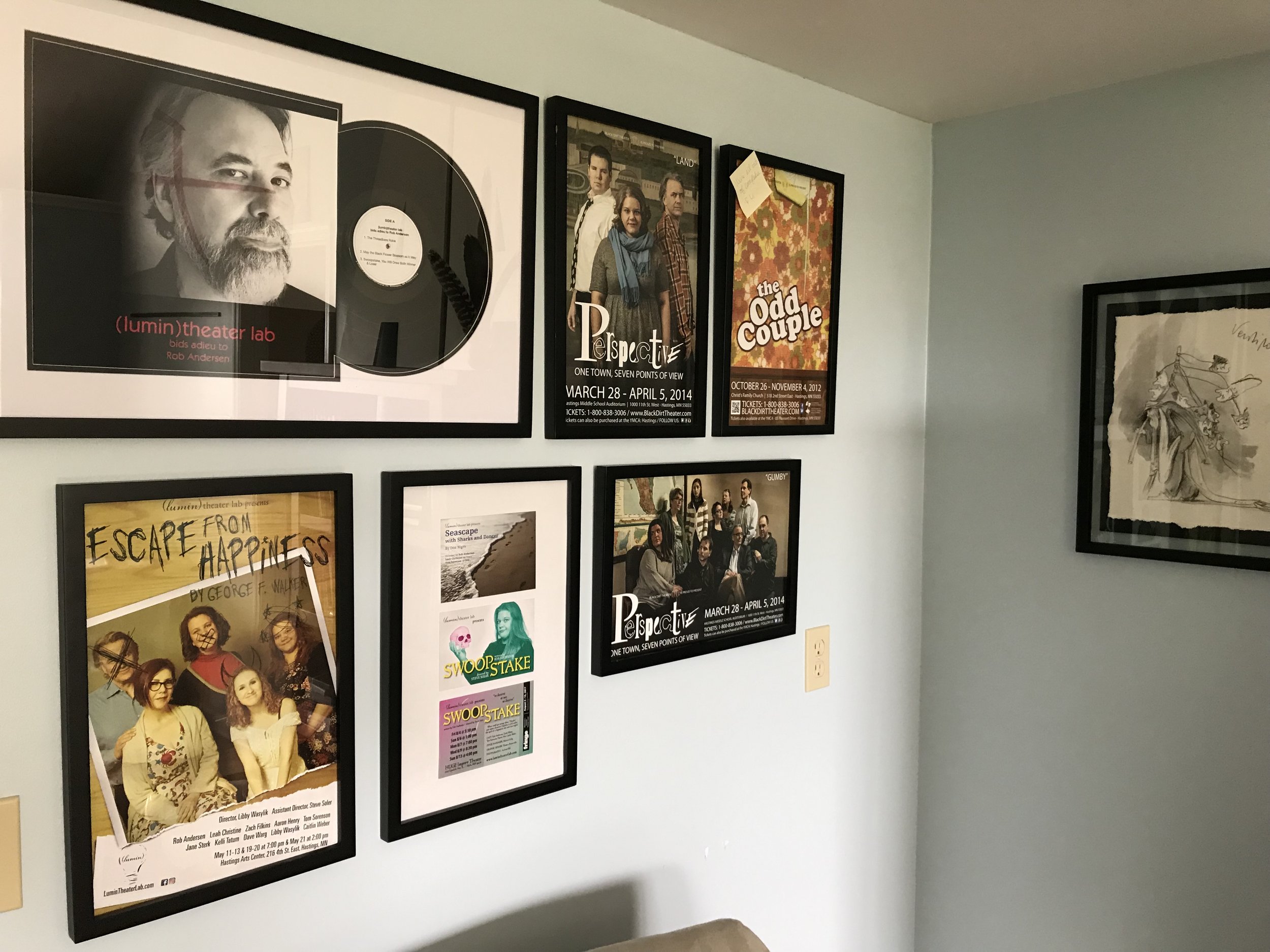 Posters from Rob’s theater productions including the album/cover they gave him as a going-away gift.