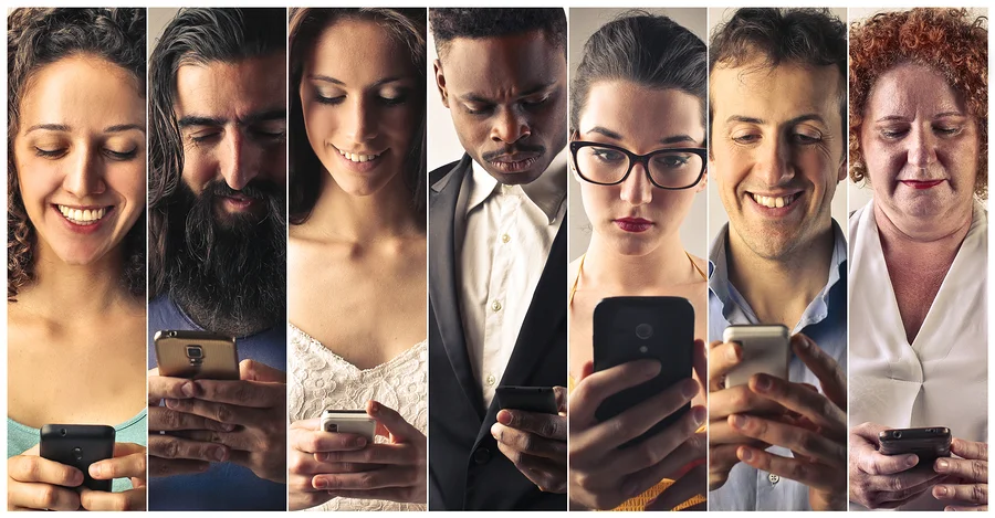 bigstock-People-sending-sms-with-their--98502779.jpg