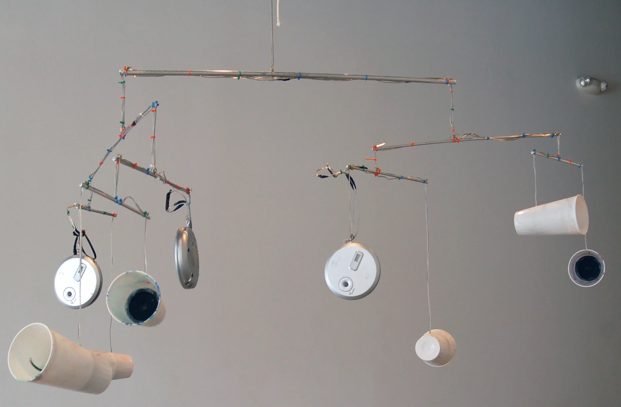  Ziggy Stardust - 2009 -&nbsp;speakers, zip ties, aluminum, plastic cups, three portable cd players playing covers of David Bowie's Ziggy Stardust - dimension variable 