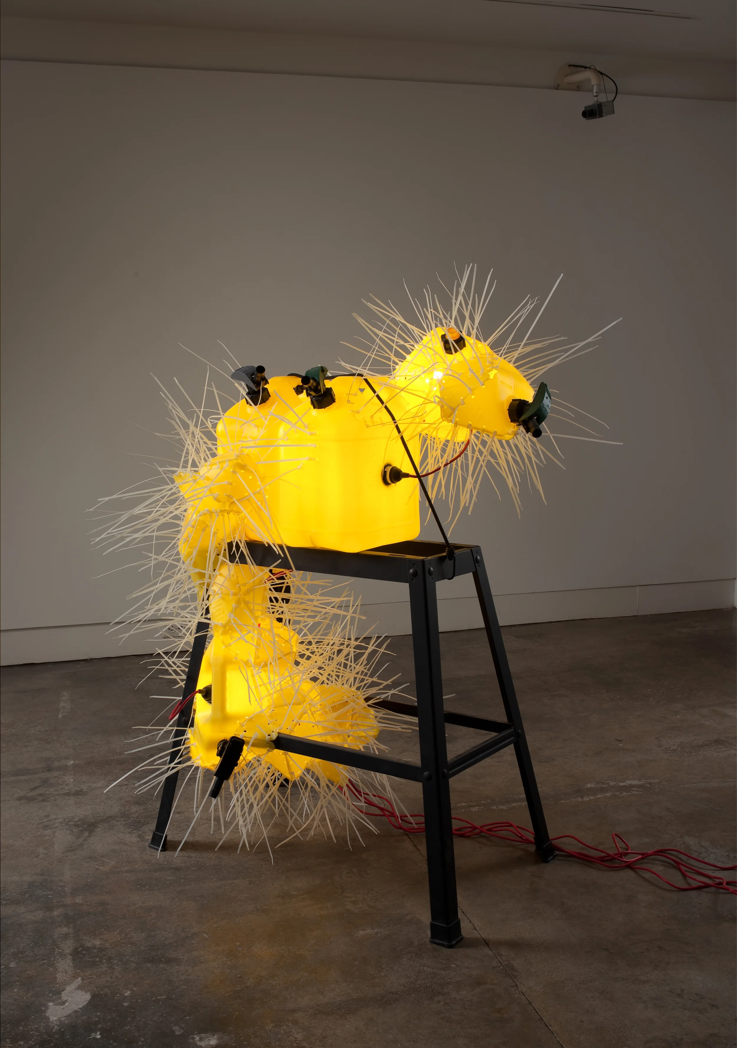   Untitled (yellow) -&nbsp;2010 - diesel gas cans, zip ties, steel stand and lights  