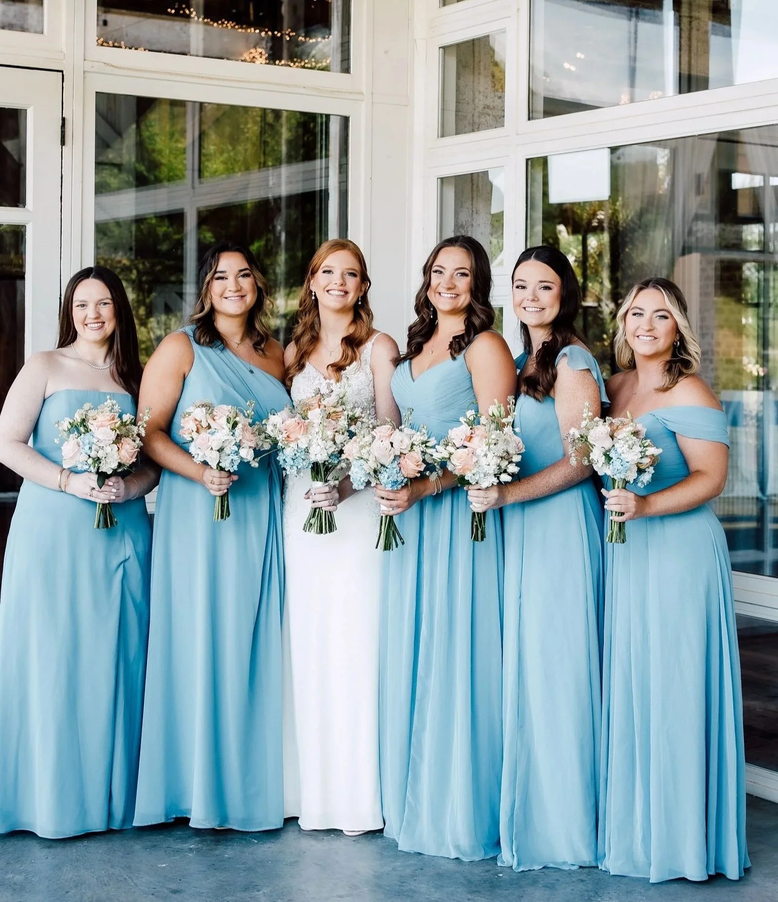 bride with bridesmaids wedding day on covered porch at jefferson oxford ms