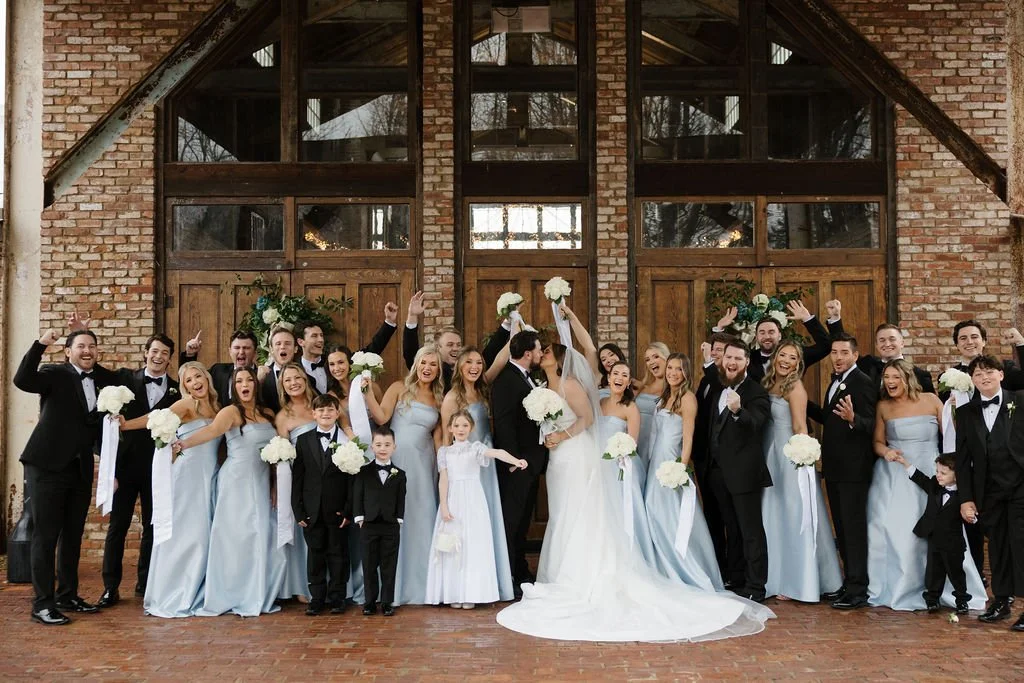 couple bridal party cheering front entrance jefferson oxford ms