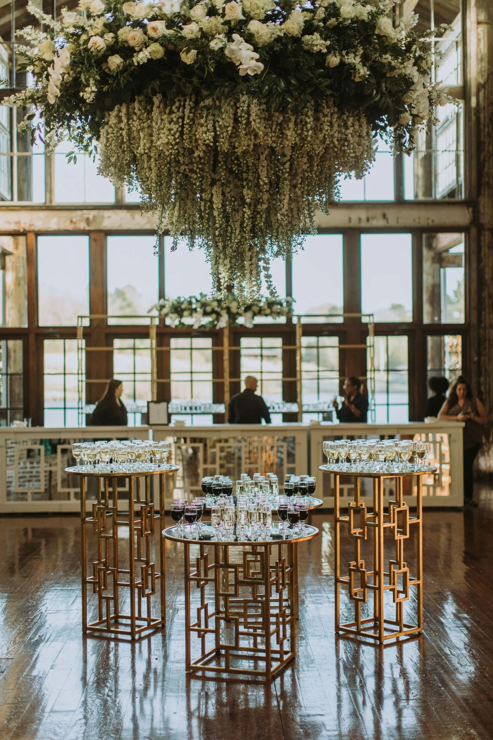 orchid floral chandelier hanging in faulkner room for cocktail hour at the jefferson oxford