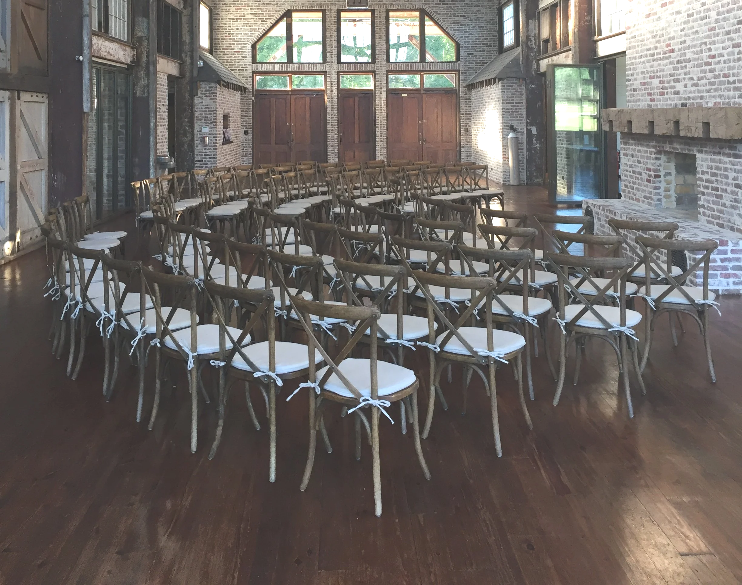 chairs setup for wedding in front of faulkner room fireplace at the Jefferson Oxford