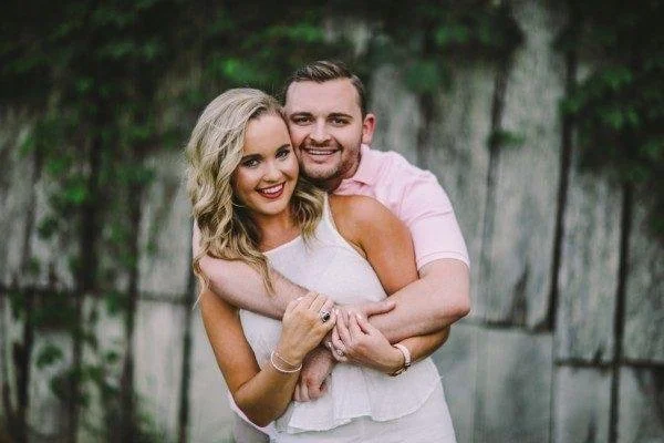 engagement photo in front of barn at jefferson oxford ms