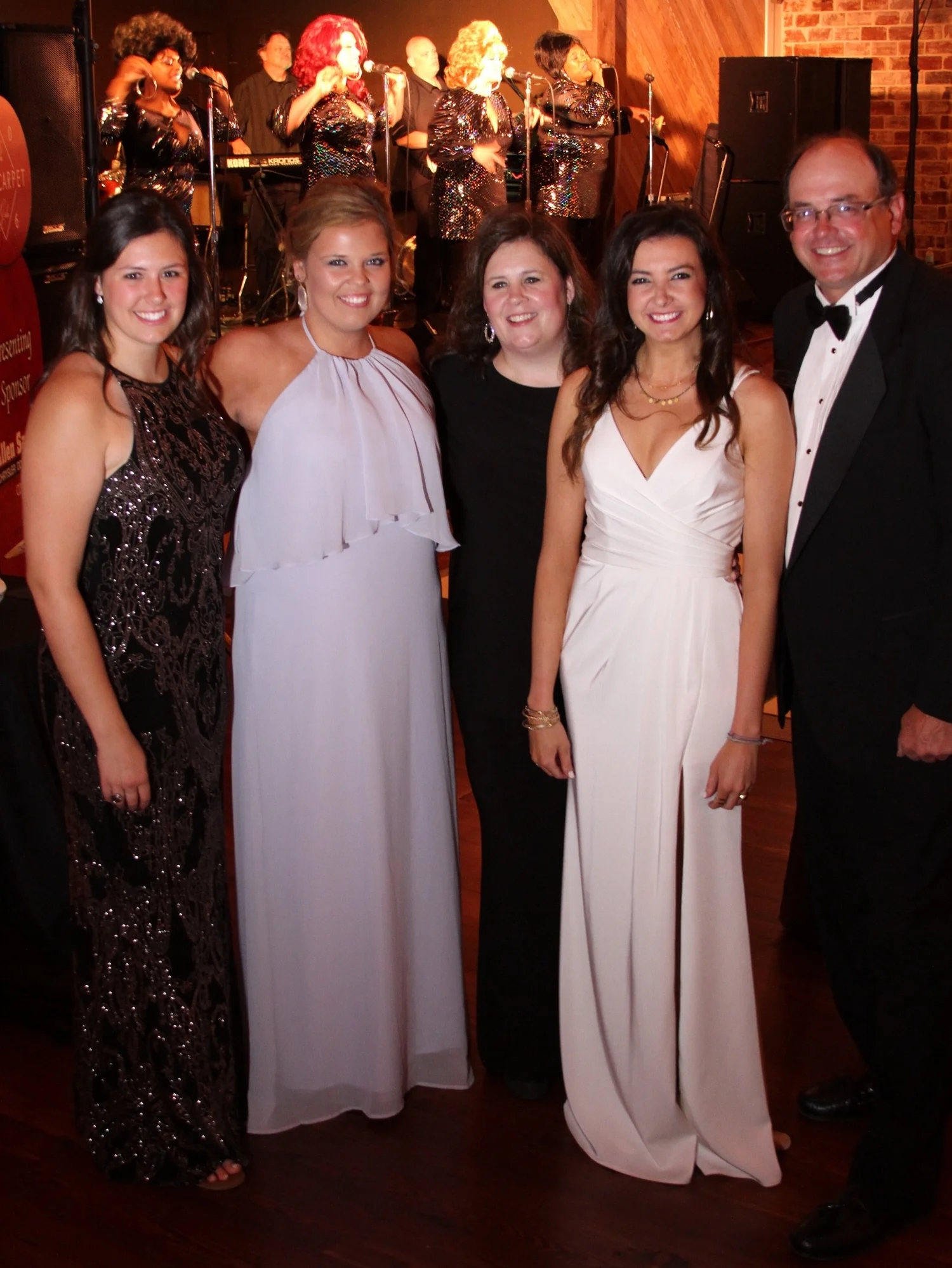 Co-owner Tom Green III with his wife, Lucy Wittichen Green, and his three daughters