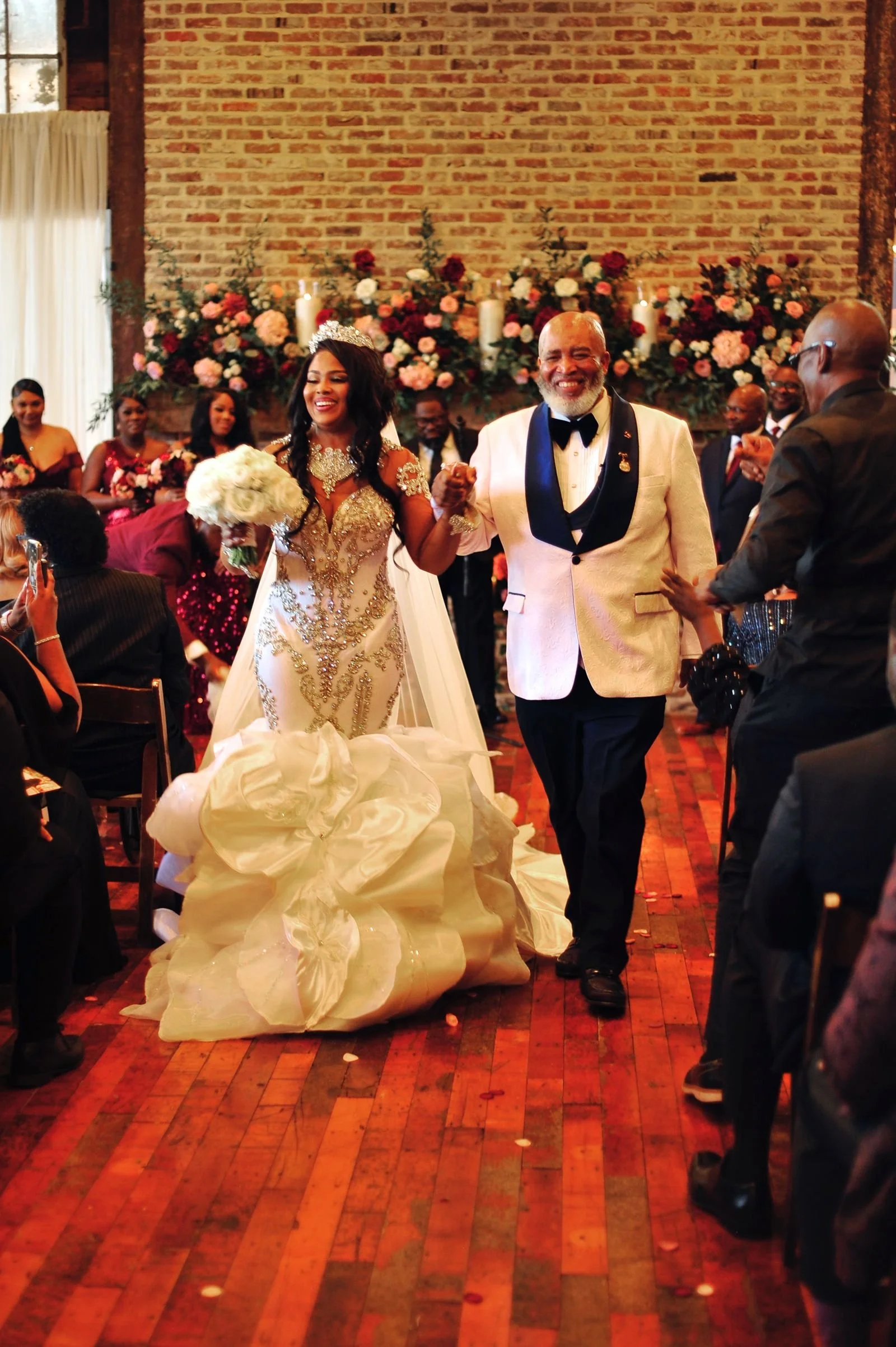 couple during recessional from wedding ceremony in Lakeside Room at The Jefferson Oxford
