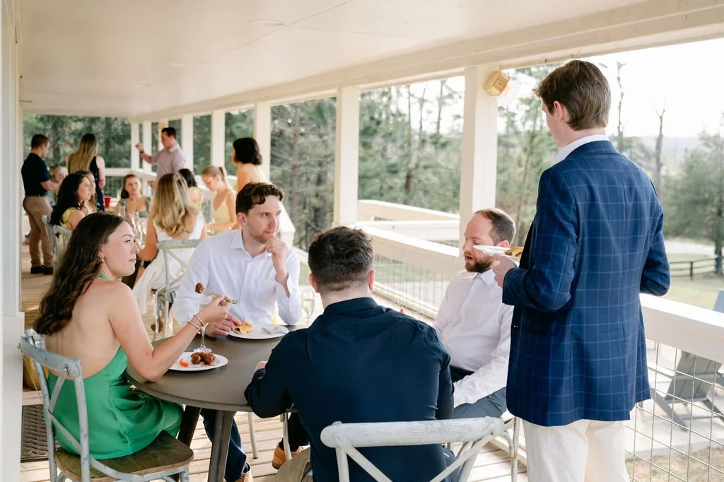 Jefferson guest house covered porch dining during rehearsal dinner