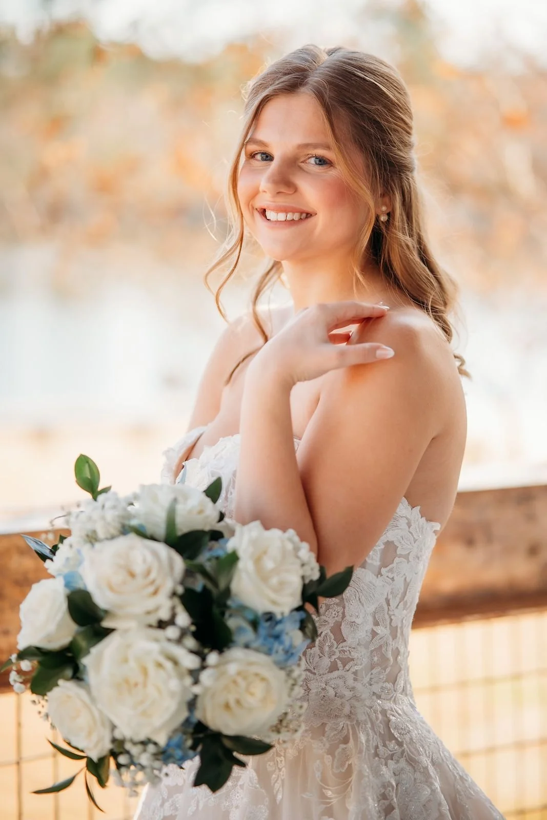 bride with bouquet outside on wedding day at the jefferson oxford ms
