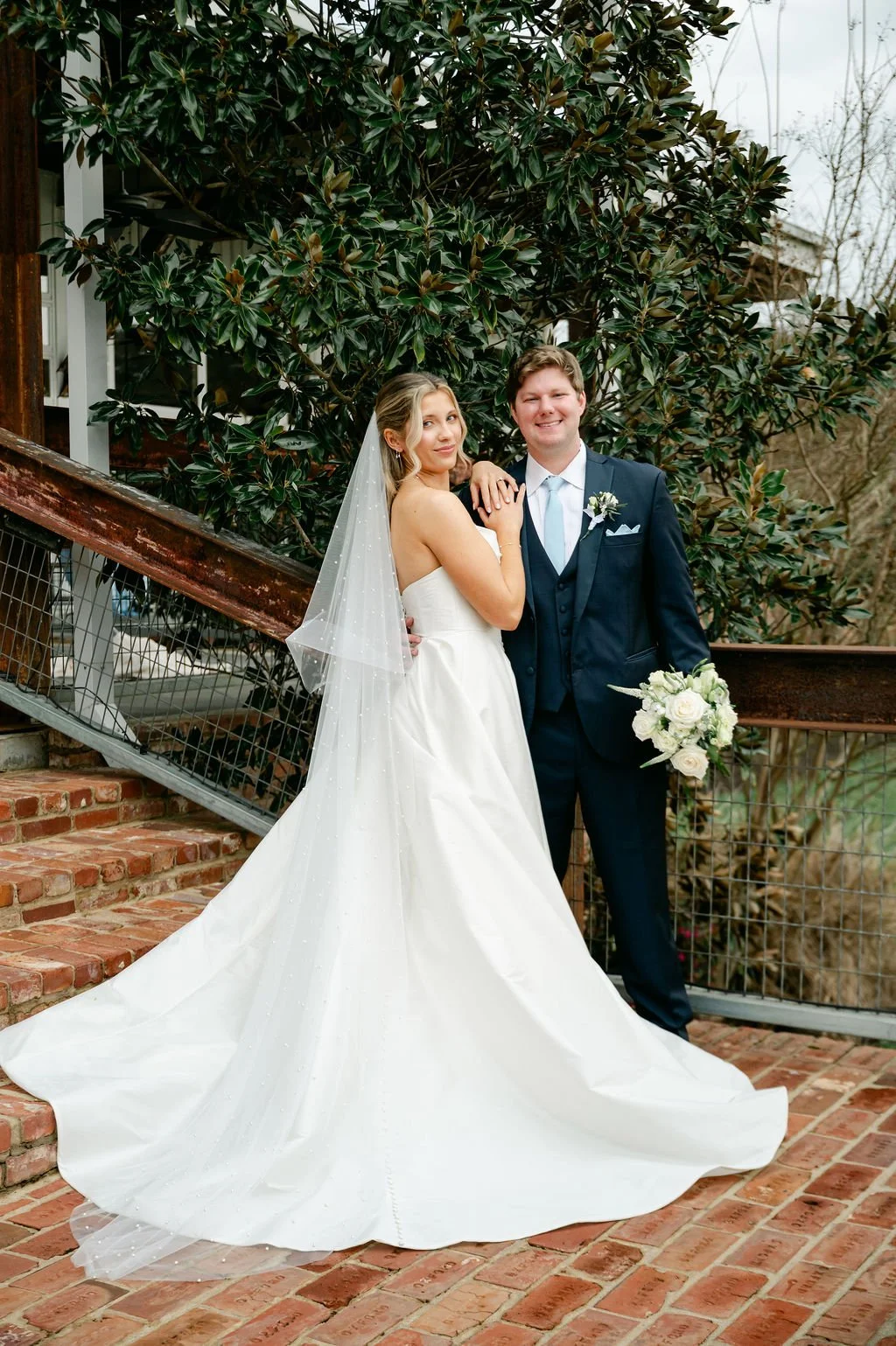 couple lakefront stairway wedding day jefferson oxford ms
